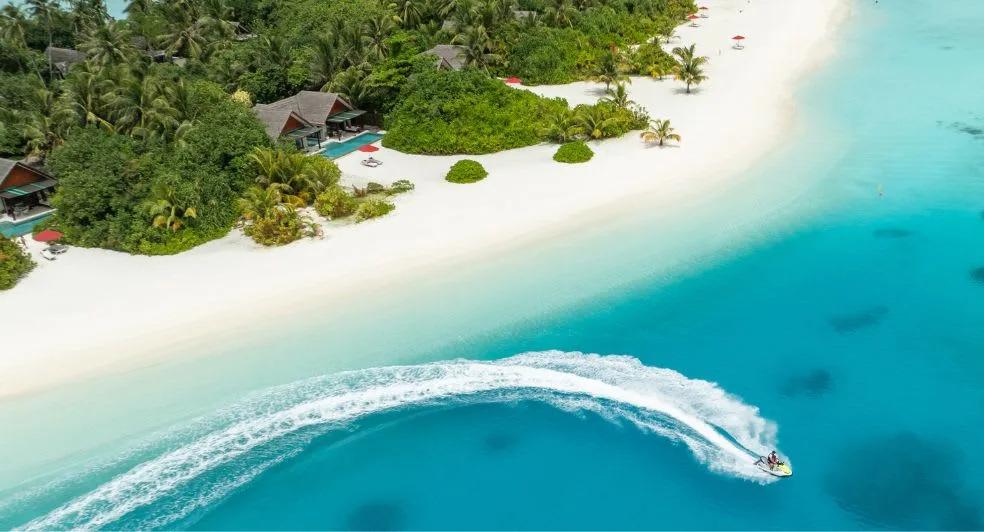 A speedboat run out from Niyama toward Vodi Point, the surf break off the resort's own shore