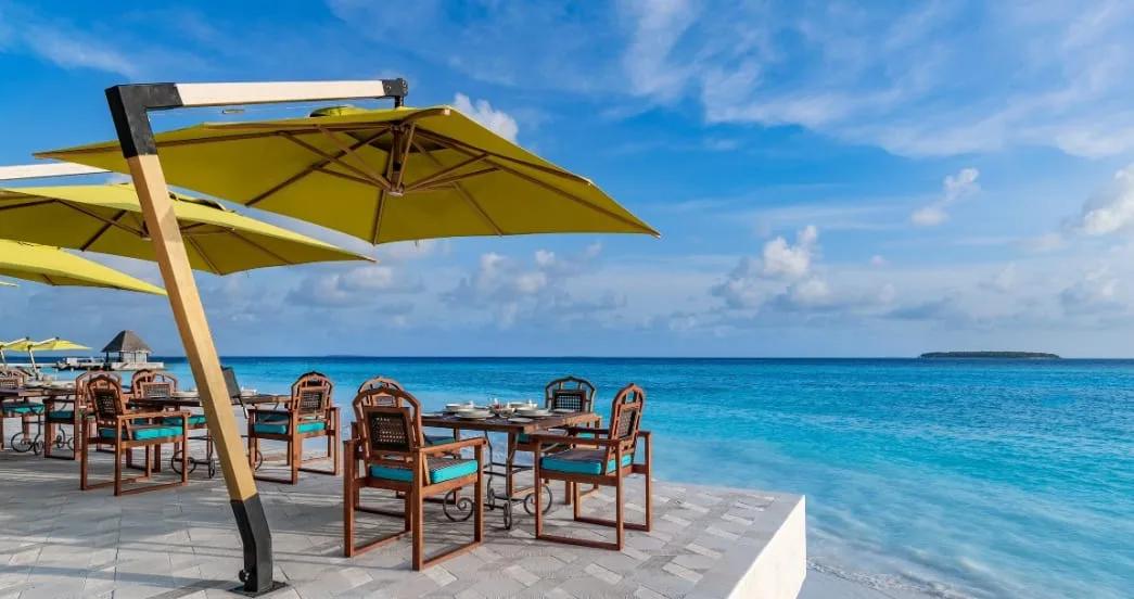 Breakfast buffet setup at PLATES restaurant, Anantara Kihavah Maldives Villas