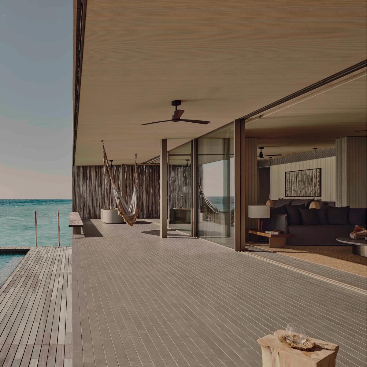An overwater deck and infinity-edge plunge pool at a Two-Bedroom Water Pool Villa, running straight into the open ocean