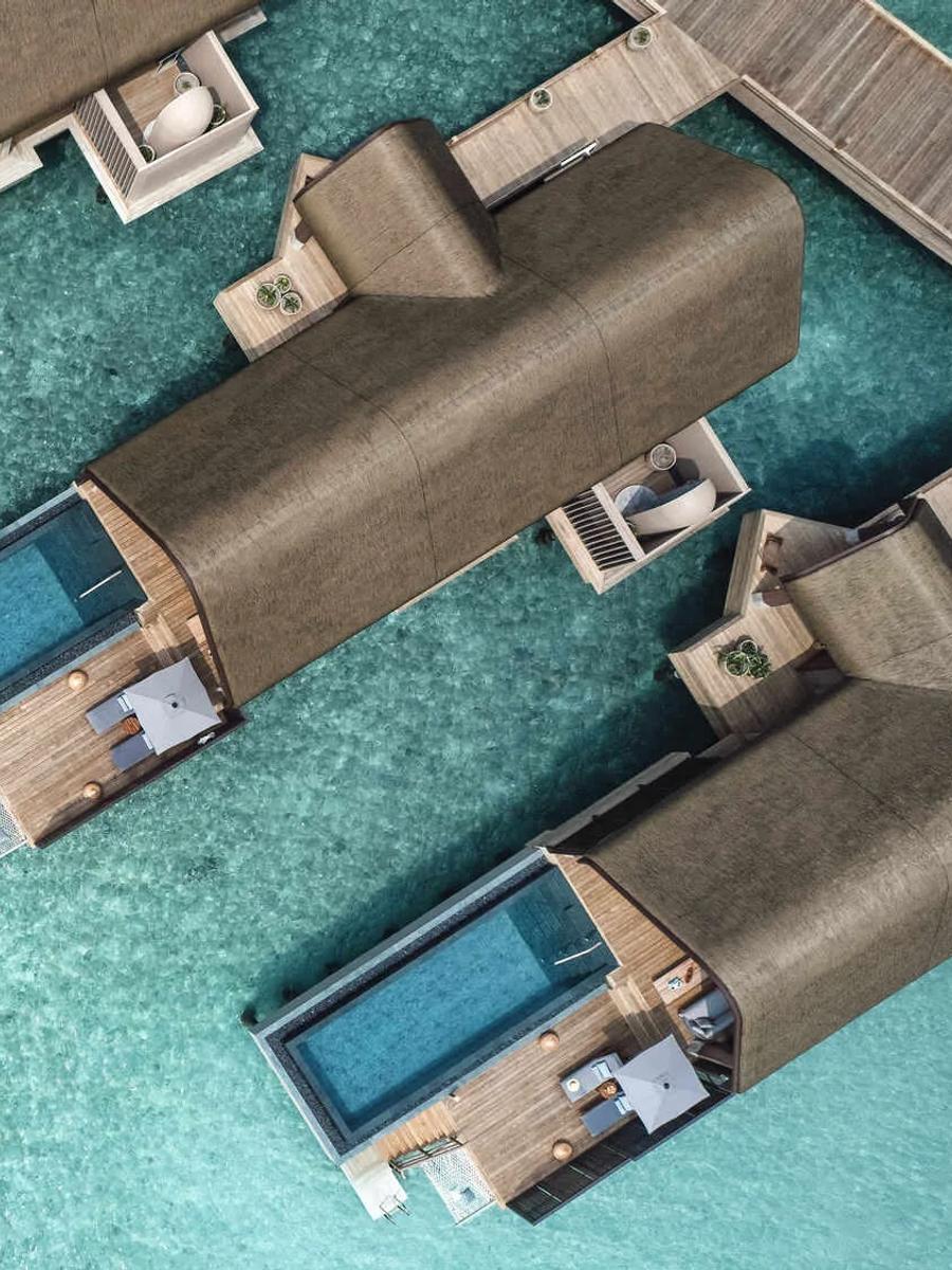 Overview of an Ocean Pool Villa at Joali Being, overwater with a private pool and sundeck
