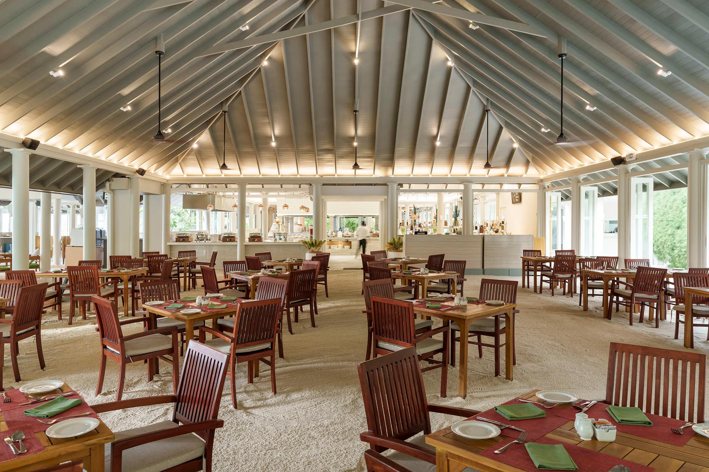 Beachfront dining setting on Dream Island — the closest photographed reference for Maghrib Grill, which has no dedicated factsheet photo