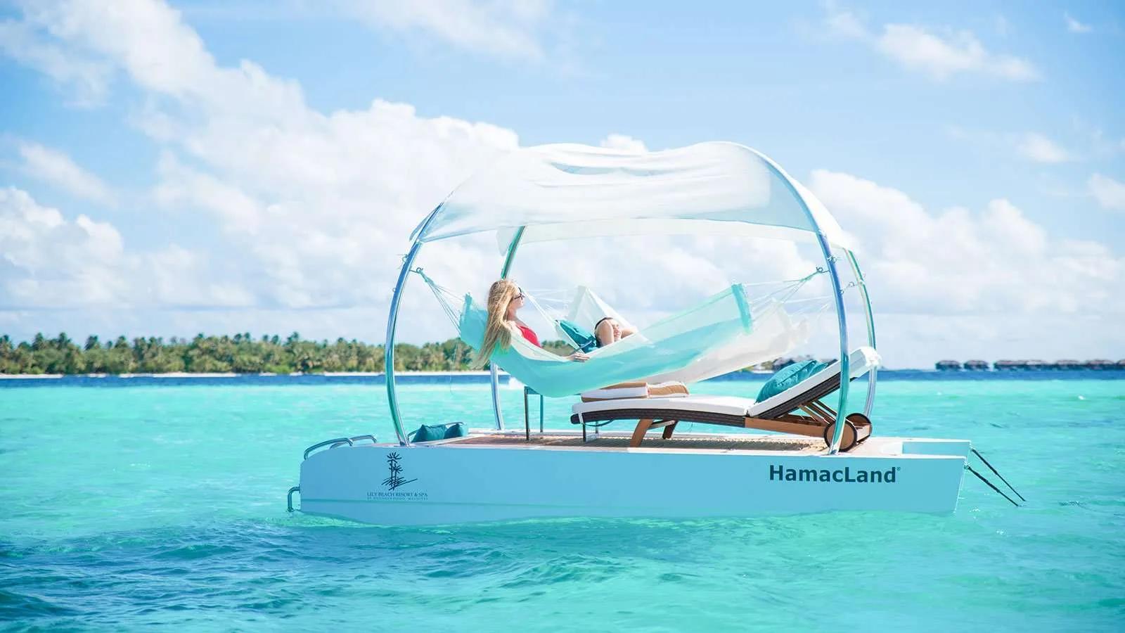 HamacLand, Lily Beach Resort & Spa's private floating hammock pontoon anchored in the lagoon