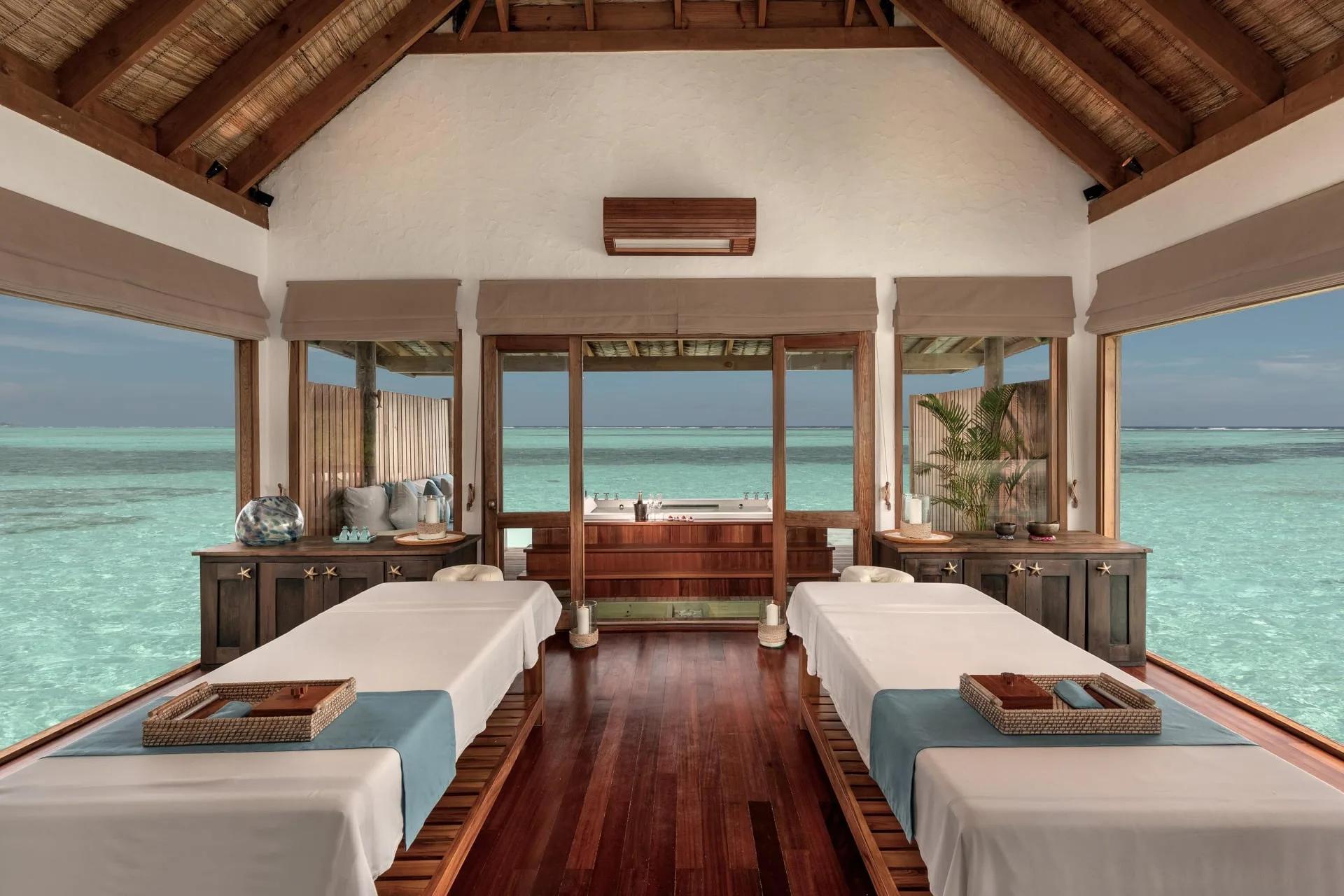 A massage treatment underway at Meera Spa, Gili Lankanfushi's spa with ocean views