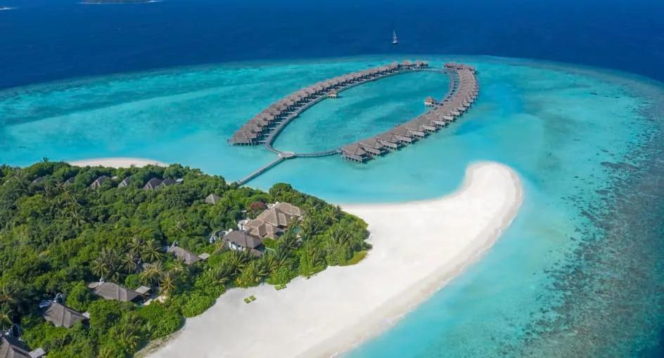 Aerial view of Anantara Kihavah Maldives Villas and its Baa Atoll lagoon