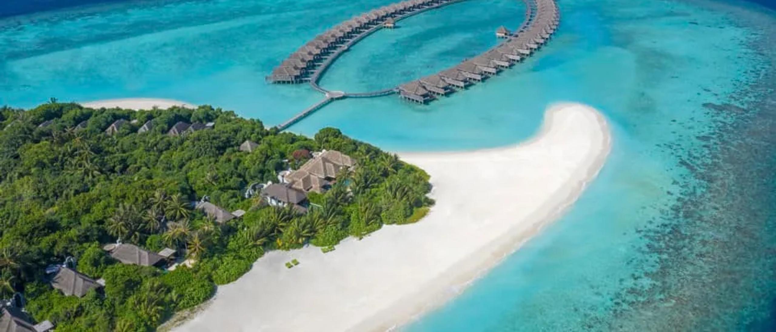 Aerial view of Anantara Kihavah Maldives Villas and its Baa Atoll lagoon