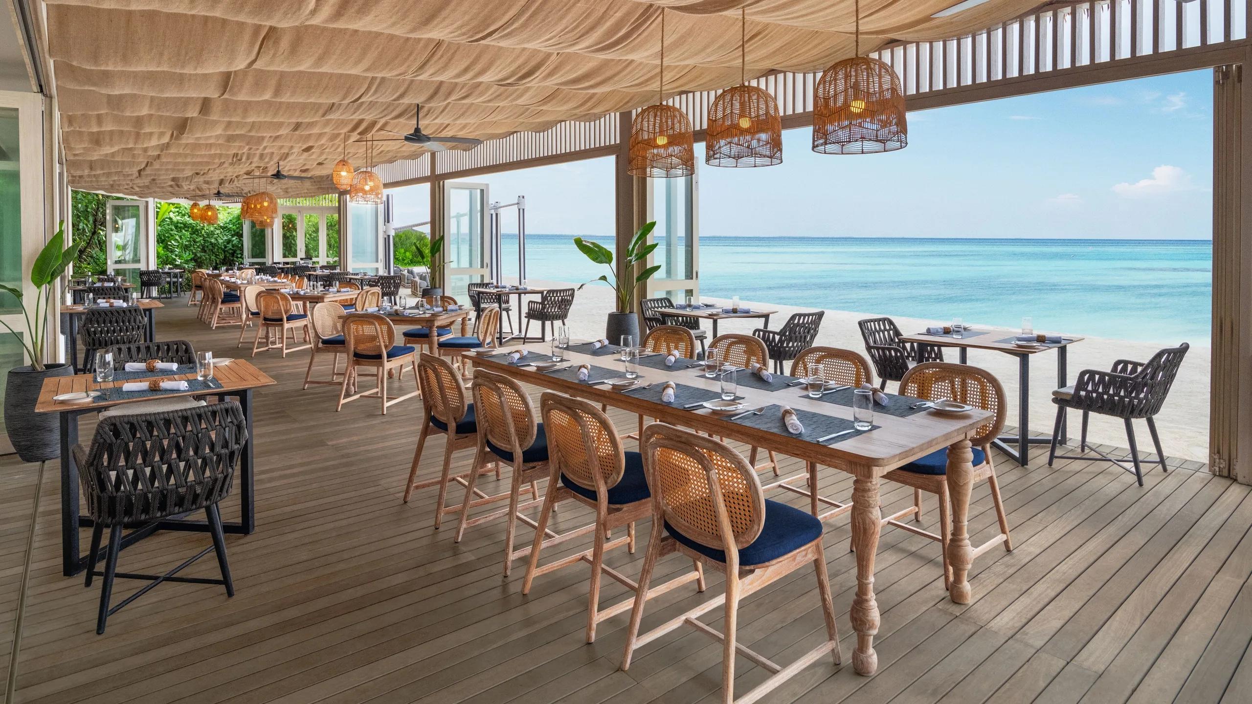 Riviera's oceanfront terrace, set for Mediterranean-inspired dining