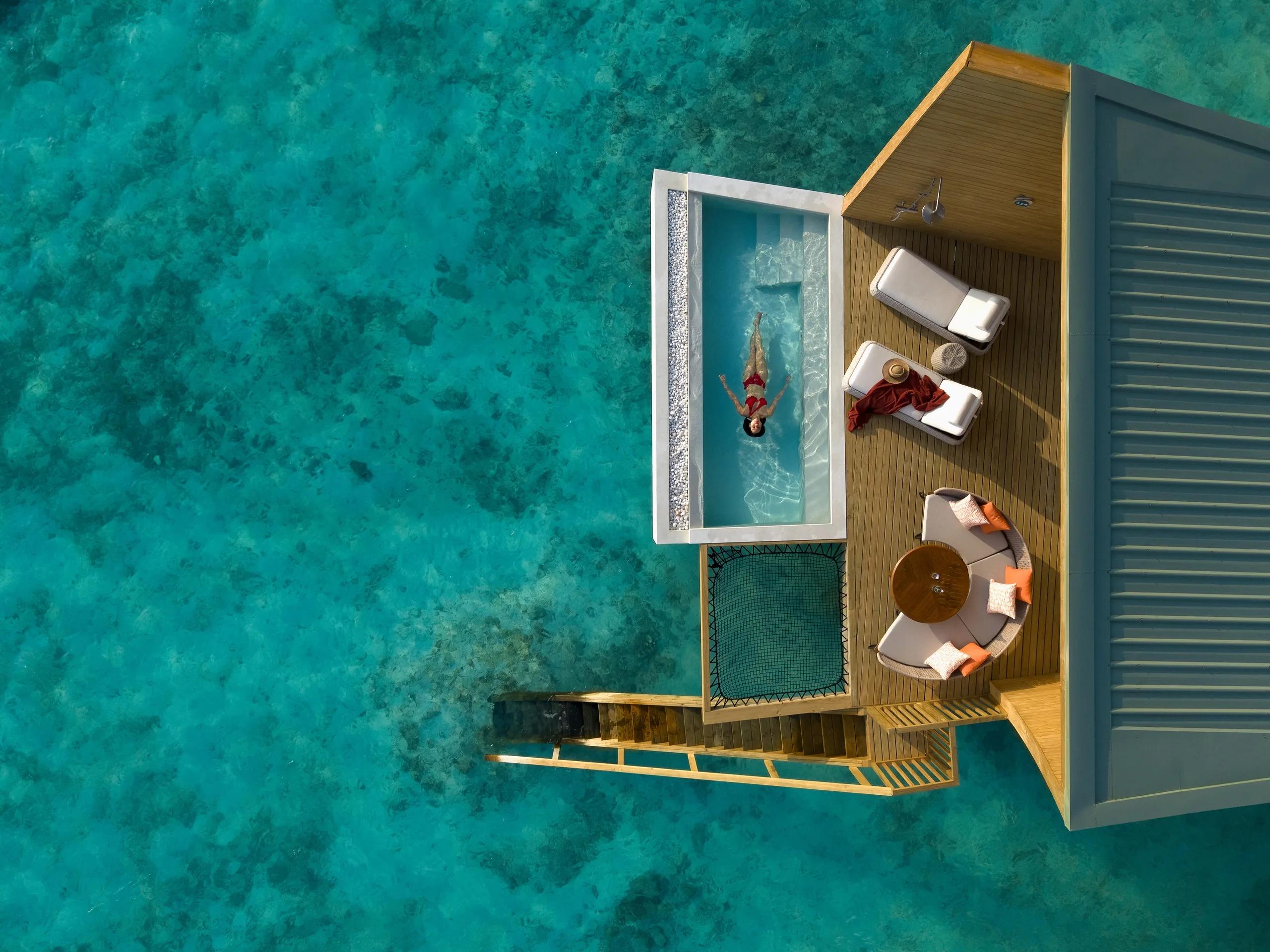 A Mirage Overwater Sunrise Pool Villa with its private pool over the lagoon
