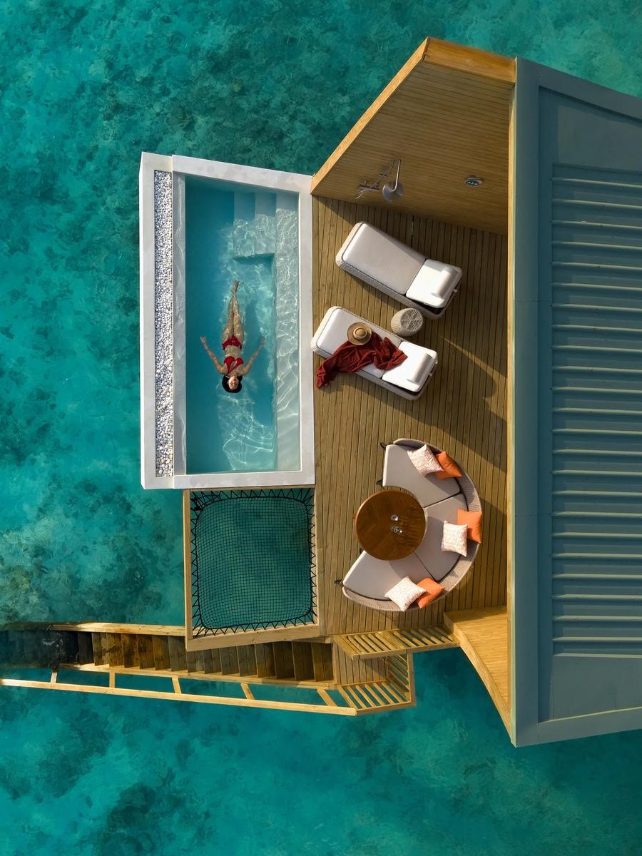 A Mirage Overwater Sunrise Pool Villa with its private pool over the lagoon