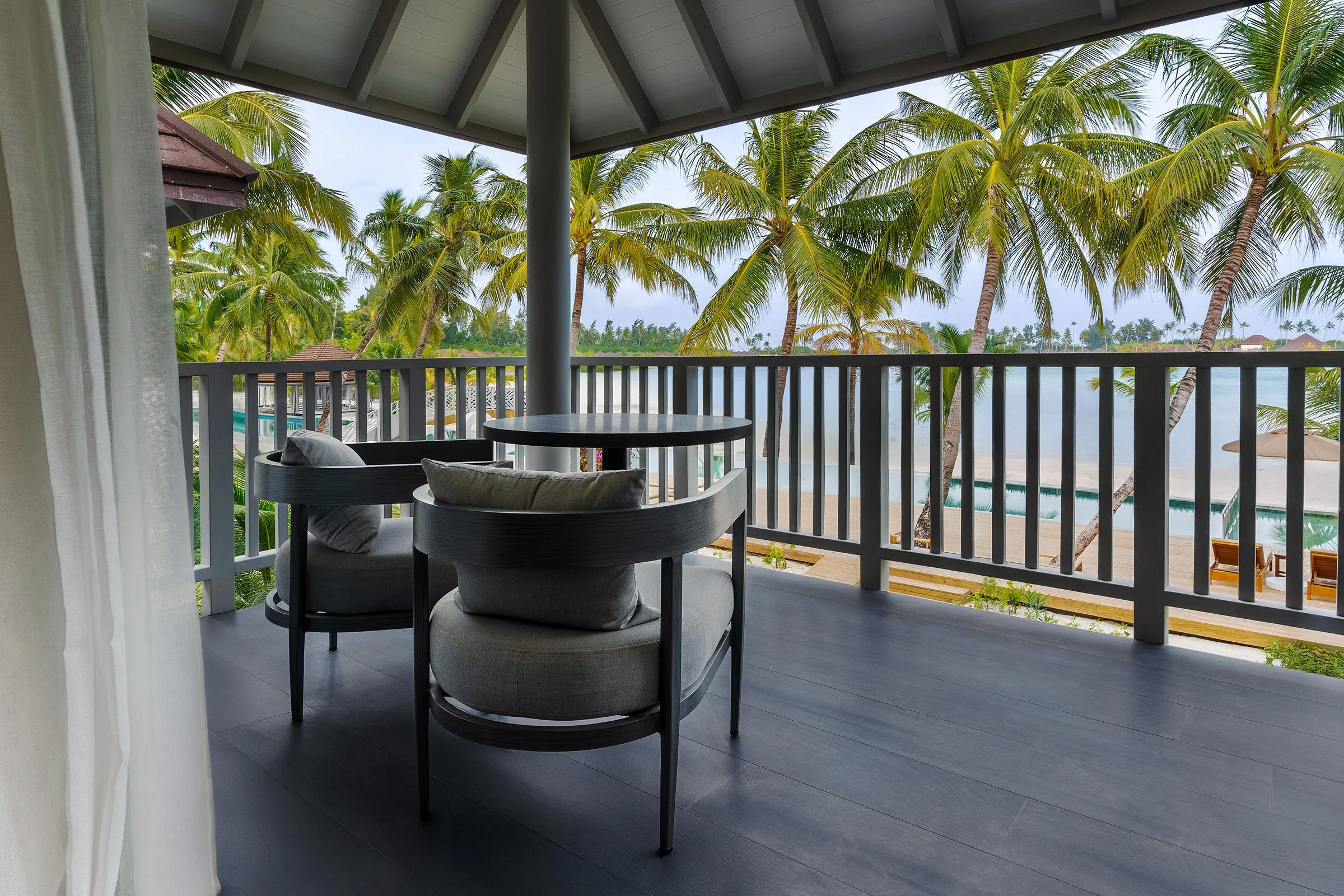 View toward the beach and pool area from a Main Island villa — the closest photographed reference for Sunrise Bar, which has no dedicated factsheet photo