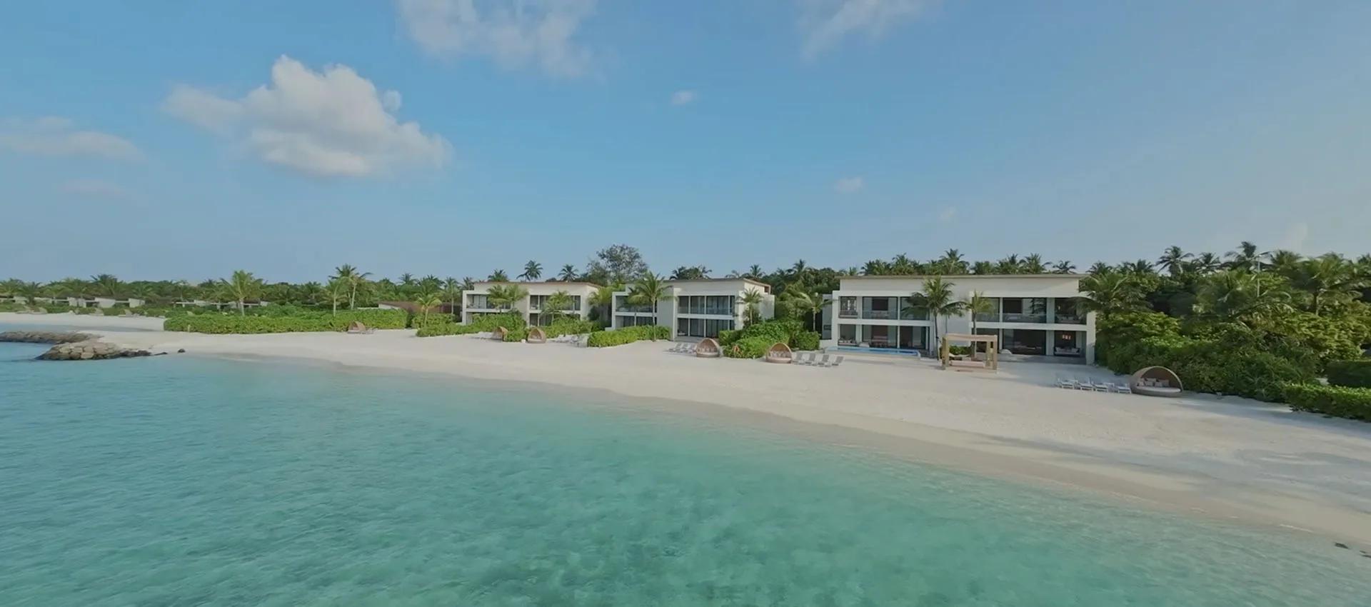 The exterior and private pool of a Four Bedroom Beach Residence at Kuda Villingili