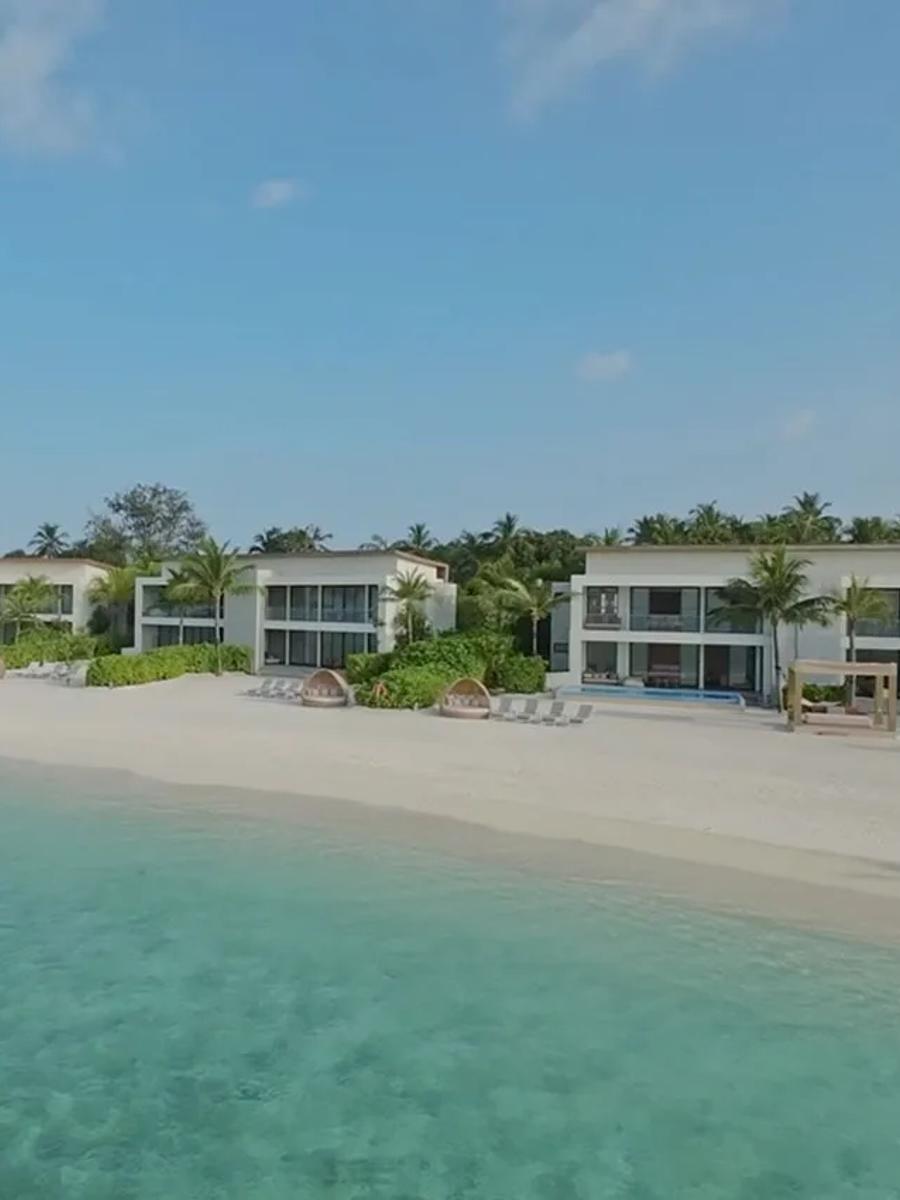 The exterior and private pool of a Four Bedroom Beach Residence at Kuda Villingili