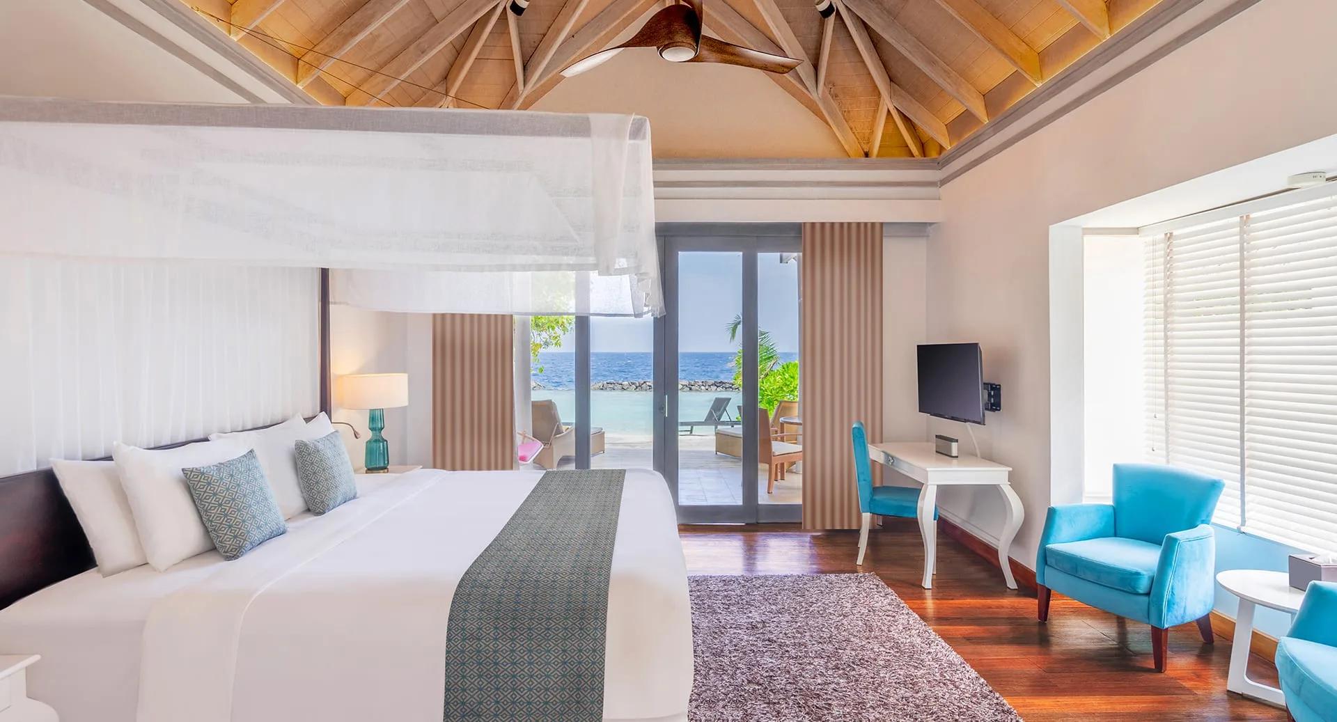 The bedroom inside a Beach Villa with Private Pool, opening onto its terrace