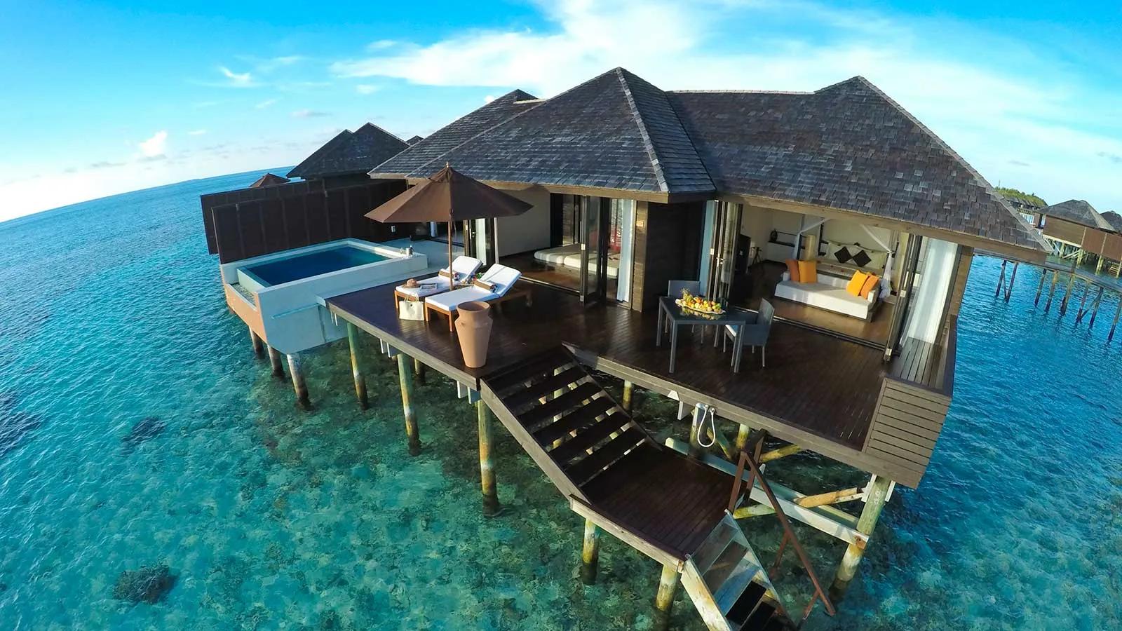 The overwater deck of a Sunset Water Suite at Lily Beach Resort & Spa