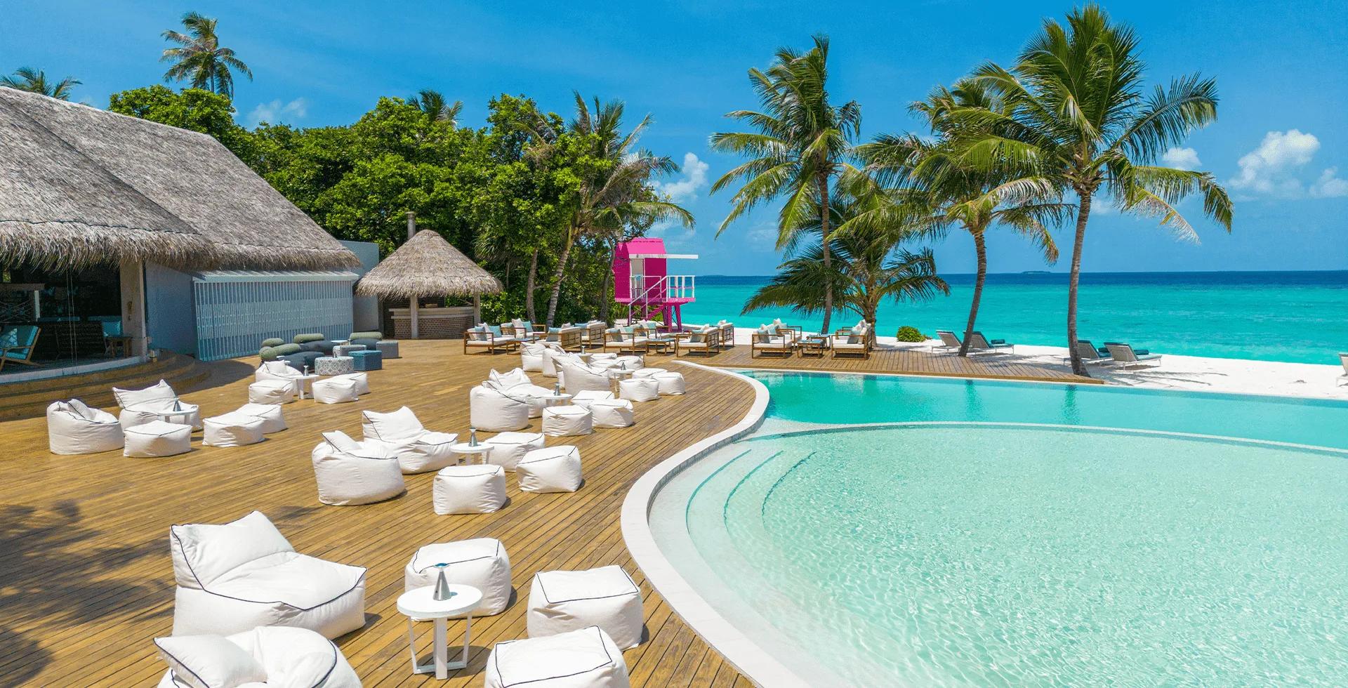 The resort's main pool at Ifuru Island Maldives — no dedicated photograph of Poolside Pizza was published, so this pool image stands in