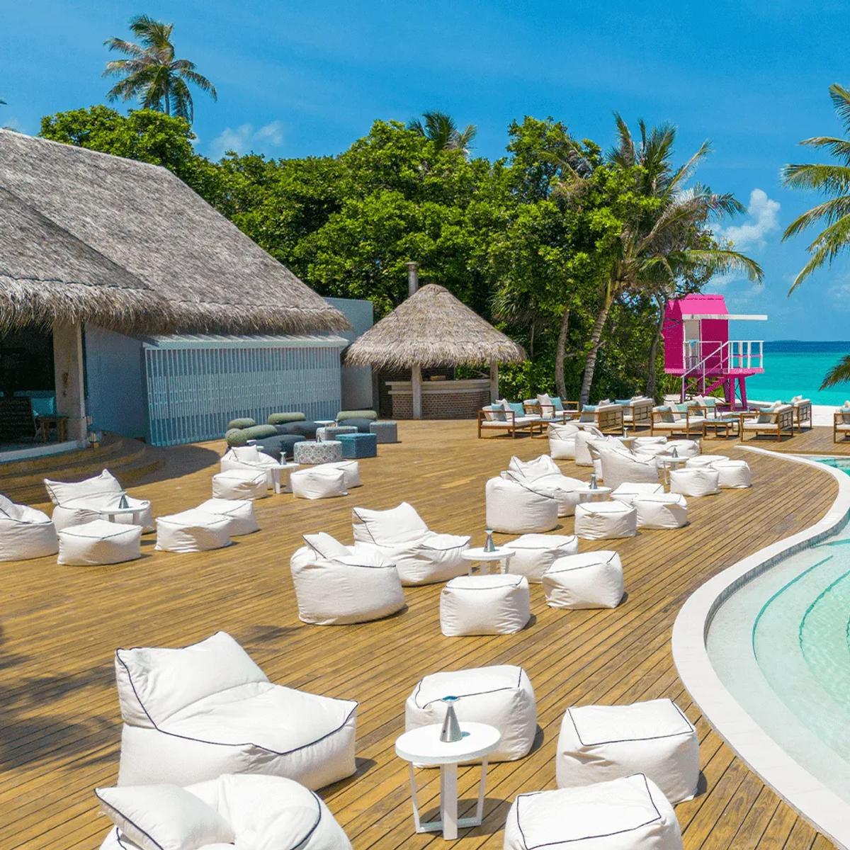 The resort's main pool at Ifuru Island Maldives — no dedicated photograph of Poolside Pizza was published, so this pool image stands in