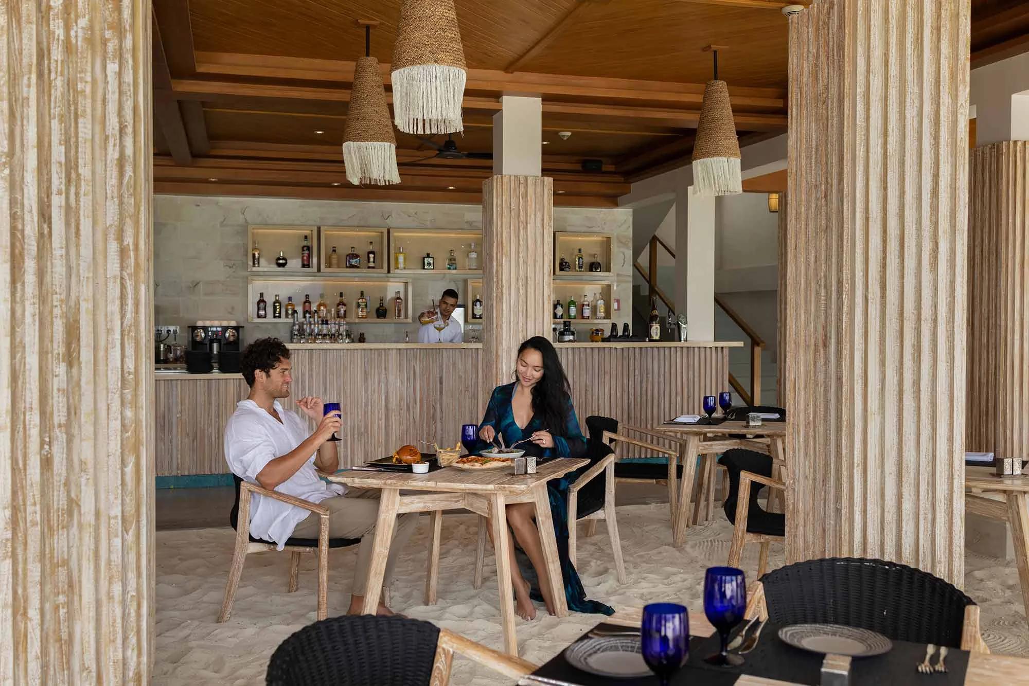 Beach Club Restaurant's beachside dining area, set for lunch