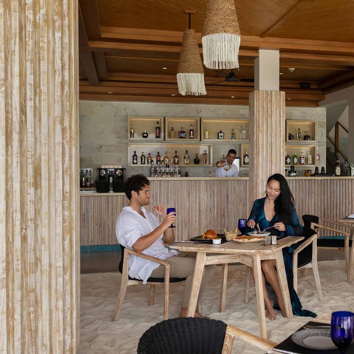 Beach Club Restaurant's beachside dining area, set for lunch