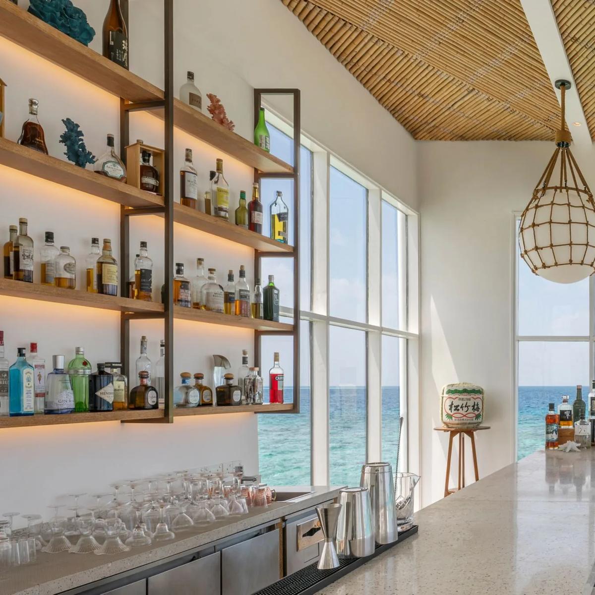 Yapa, Halcyon's overwater sunset bar
