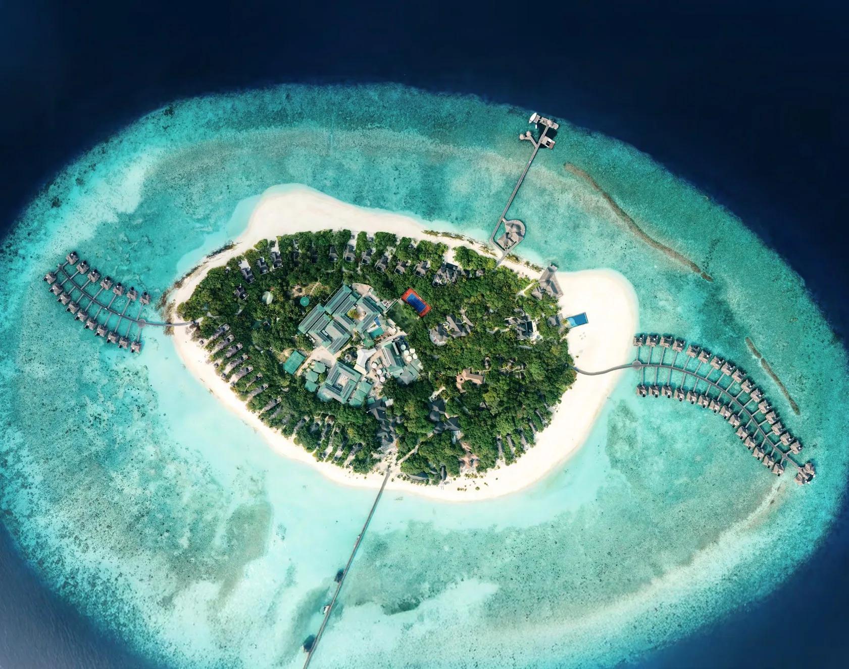 Aerial view of JA Manafaru's turtle-shaped island in Haa Alifu Atoll, the Maldives' northernmost atoll