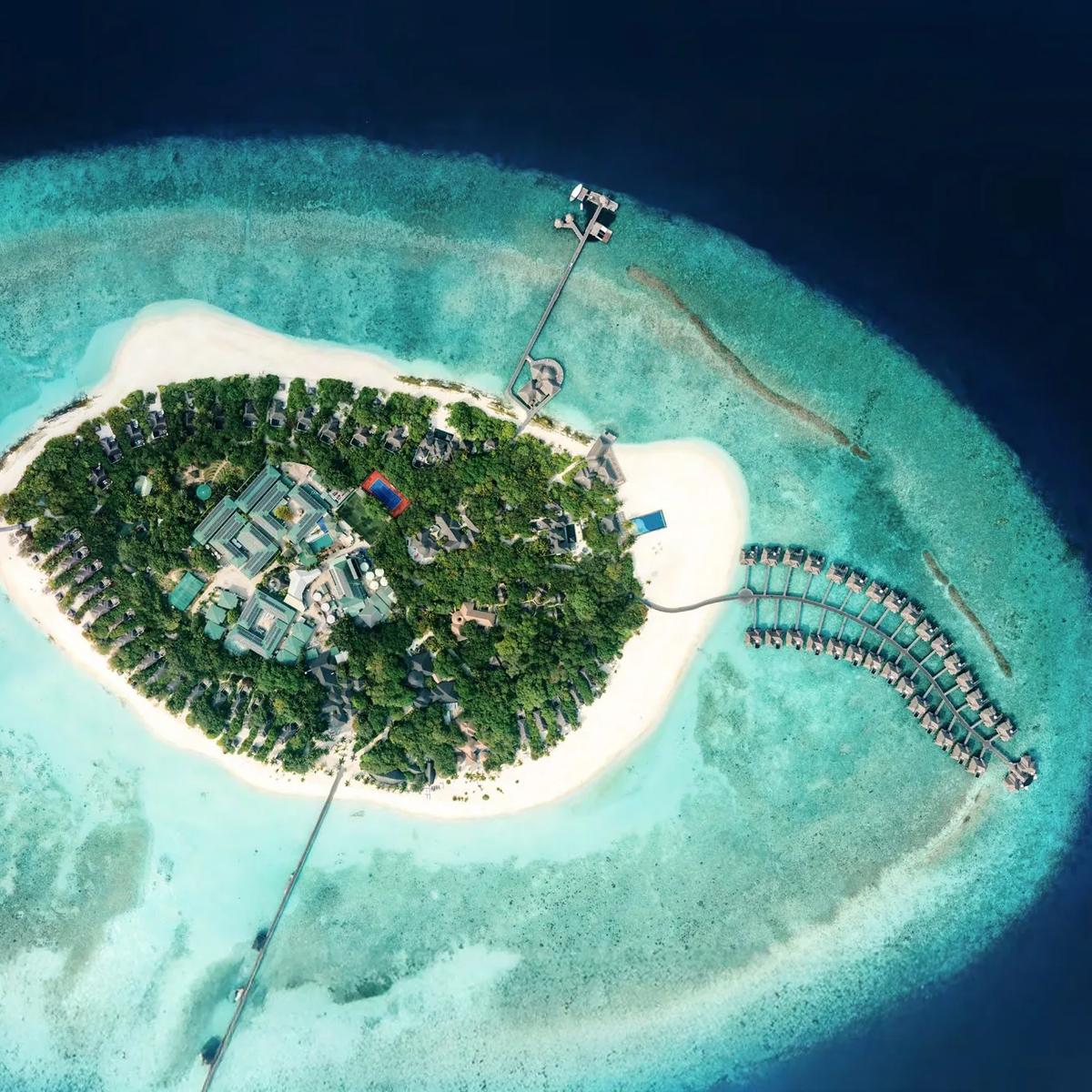 Aerial view of JA Manafaru's turtle-shaped island in Haa Alifu Atoll, the Maldives' northernmost atoll