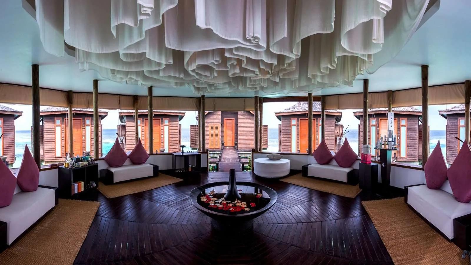 A panoramic view of Tamara Spa's overwater deck at Lily Beach Resort & Spa