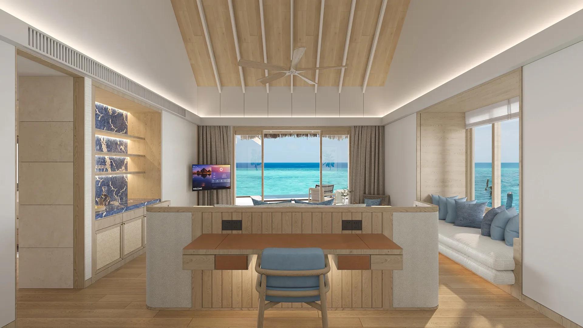 Water Bungalow with Pool living area with a daybed built into the window seat, the lagoon visible through sliding glass doors