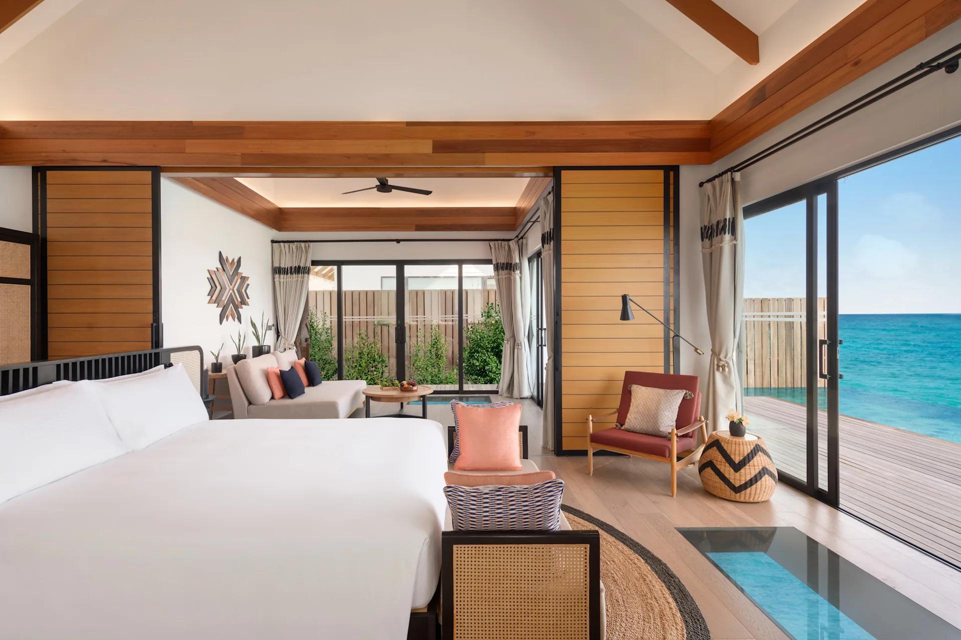 The exterior of a One Bedroom Overwater Suite with Pool