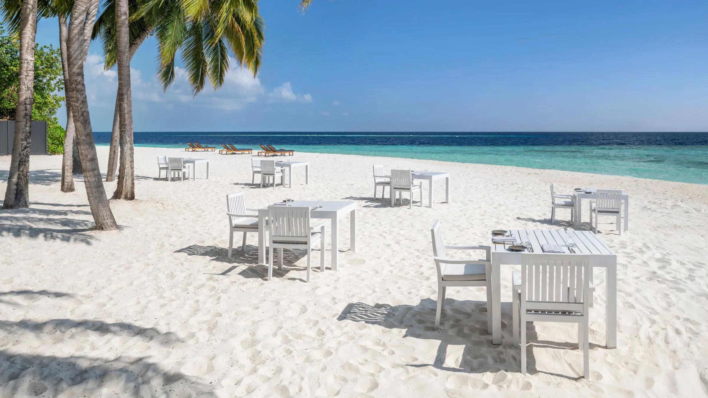 Daytime view of The Firepit's open-air beach grill setting, ahead of its twice-weekly dinner service