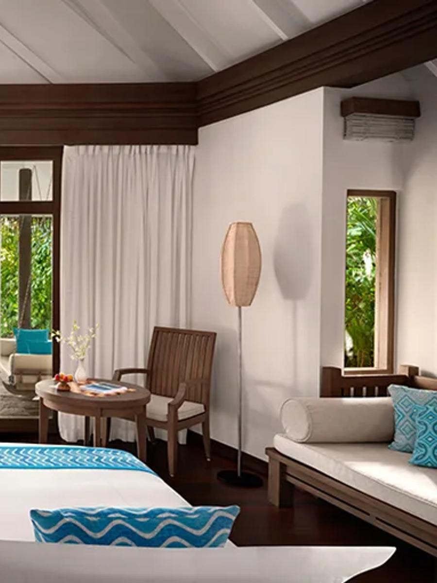 Bedroom interior of a Sunset Beach Villa at Anantara Dhigu
