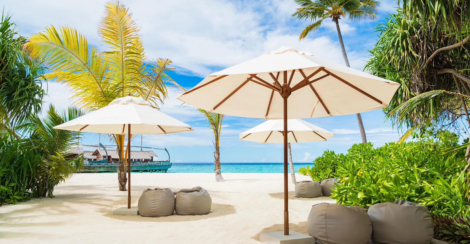 Azure, Milaidhoo's beach-shack lunch restaurant set among screw pines.