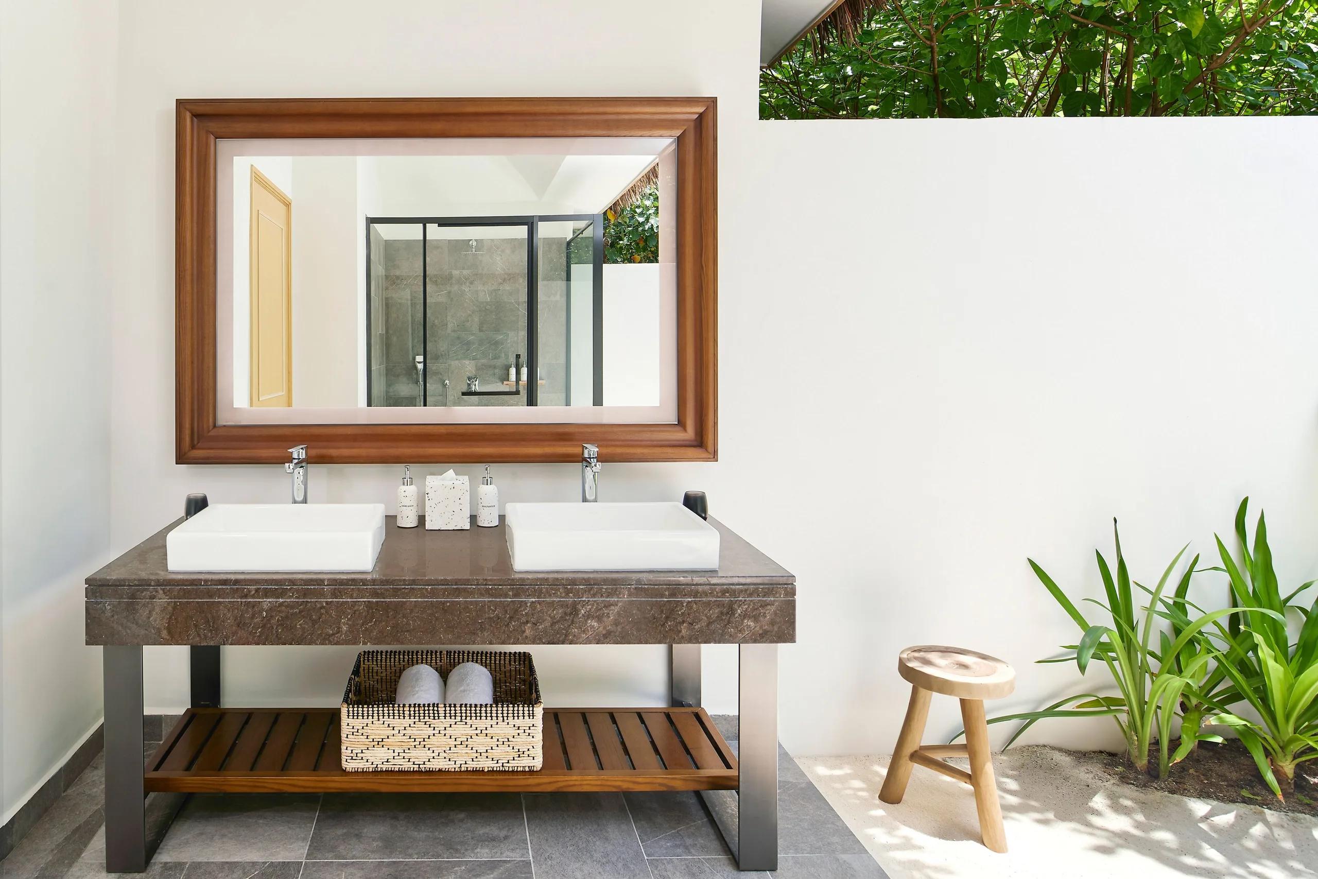 A beachfront villa exterior at Le Méridien Maldives, representative of the garden-set pool villa category — no dedicated Beach Garden Pool Villa photograph exists in the source pool