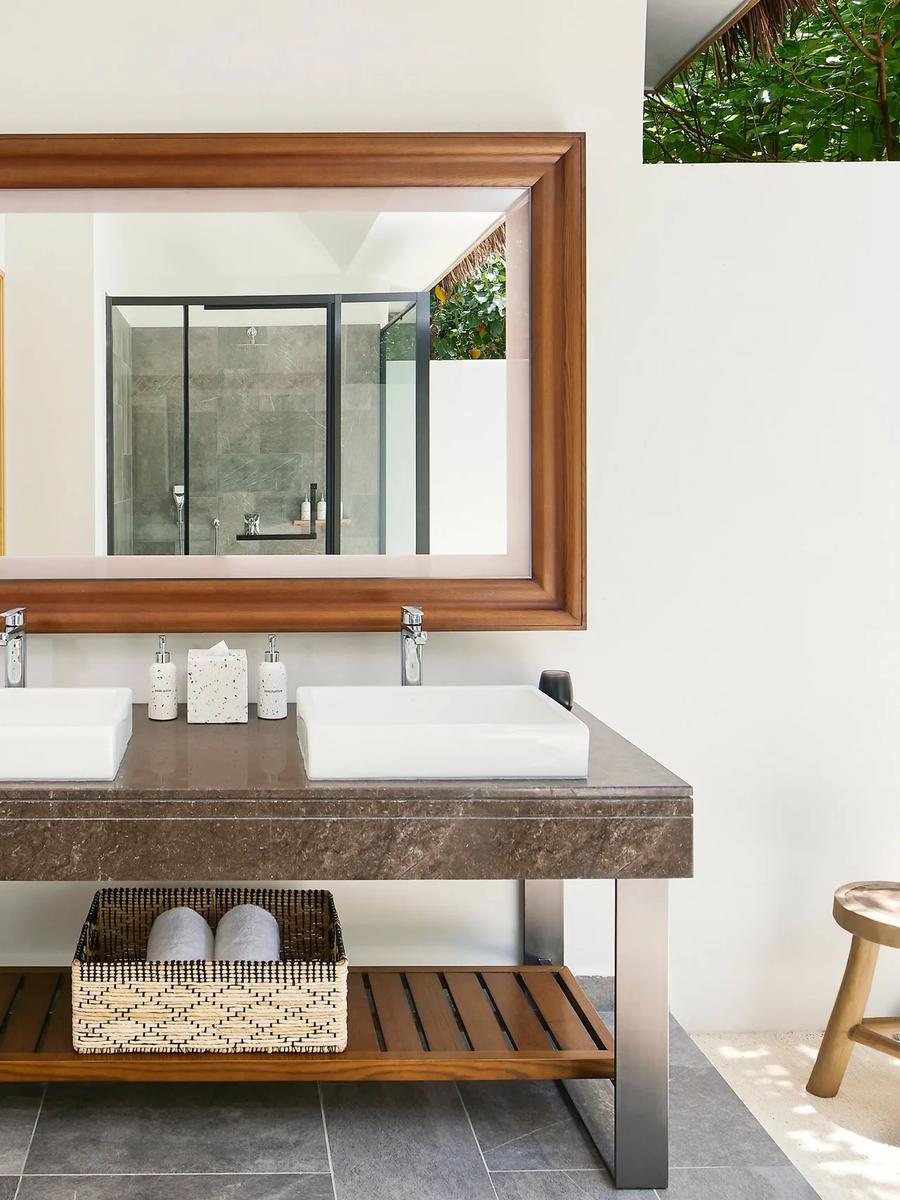 A beachfront villa exterior at Le Méridien Maldives, representative of the garden-set pool villa category — no dedicated Beach Garden Pool Villa photograph exists in the source pool