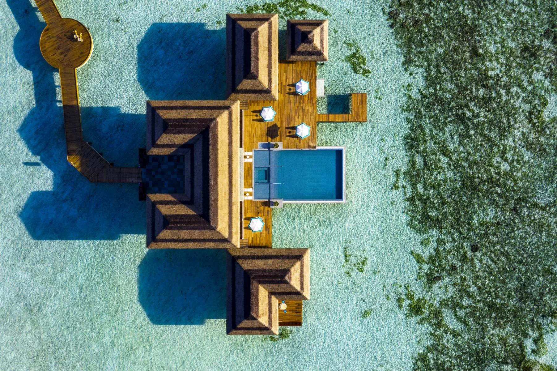 Aerial view of the Four Bedroom Ocean Pool Retreat and its overwater infinity pool