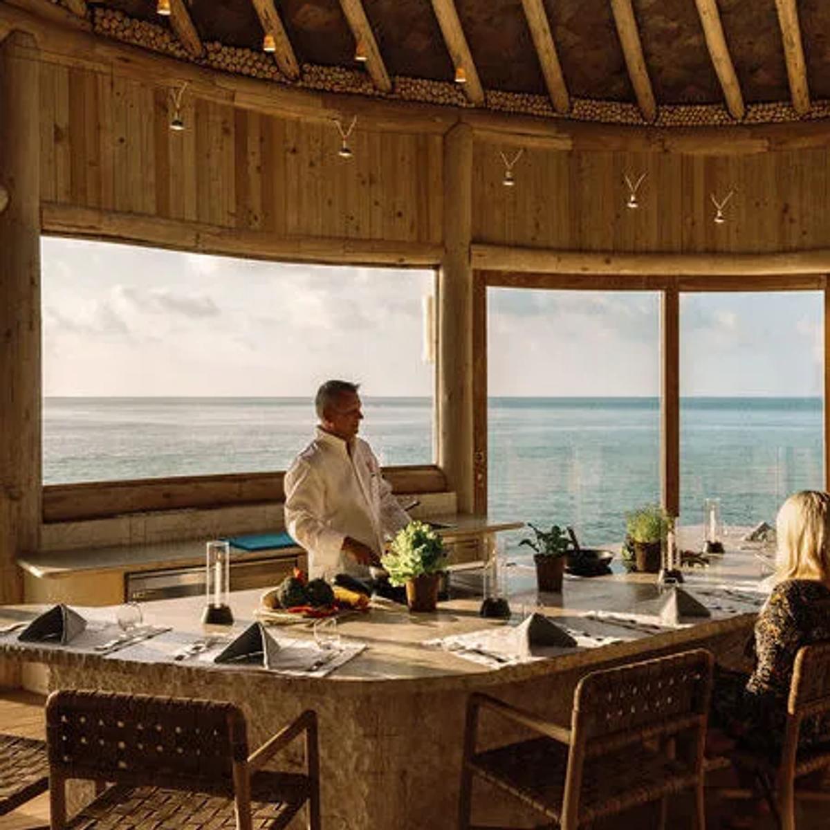 The wood-beamed dining room used here to represent Mihiree Mithaa, Soneva Fushi's breakfast and main buffet venue — a dedicated photograph of Mihiree Mithaa wasn't available in this research batch