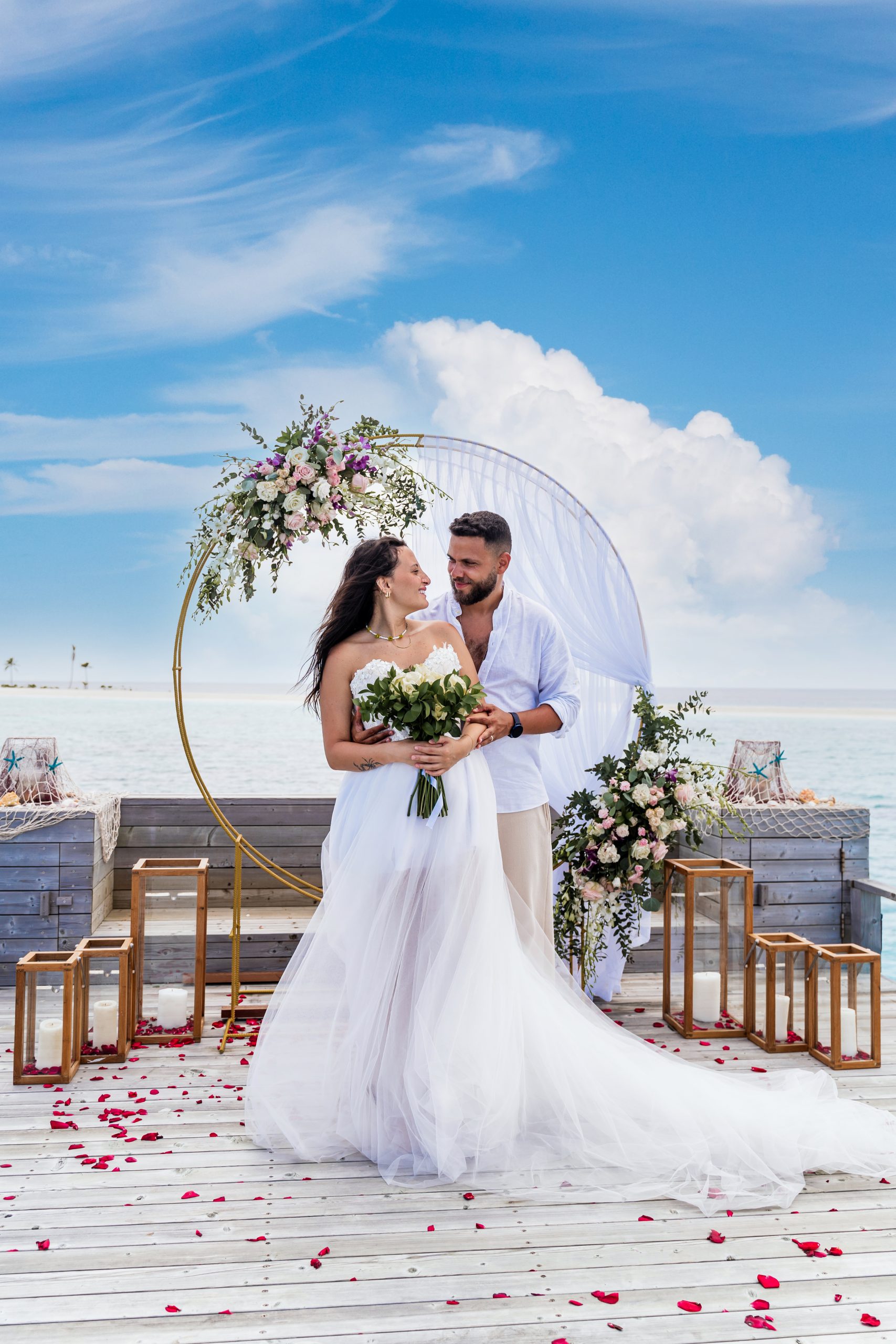 A couple during a beach ceremony in the Maldives