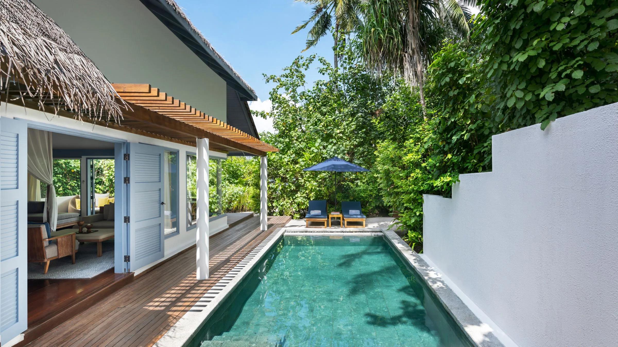 An Island Beach Villa's private pool, set among Halcyon's dense island greenery
