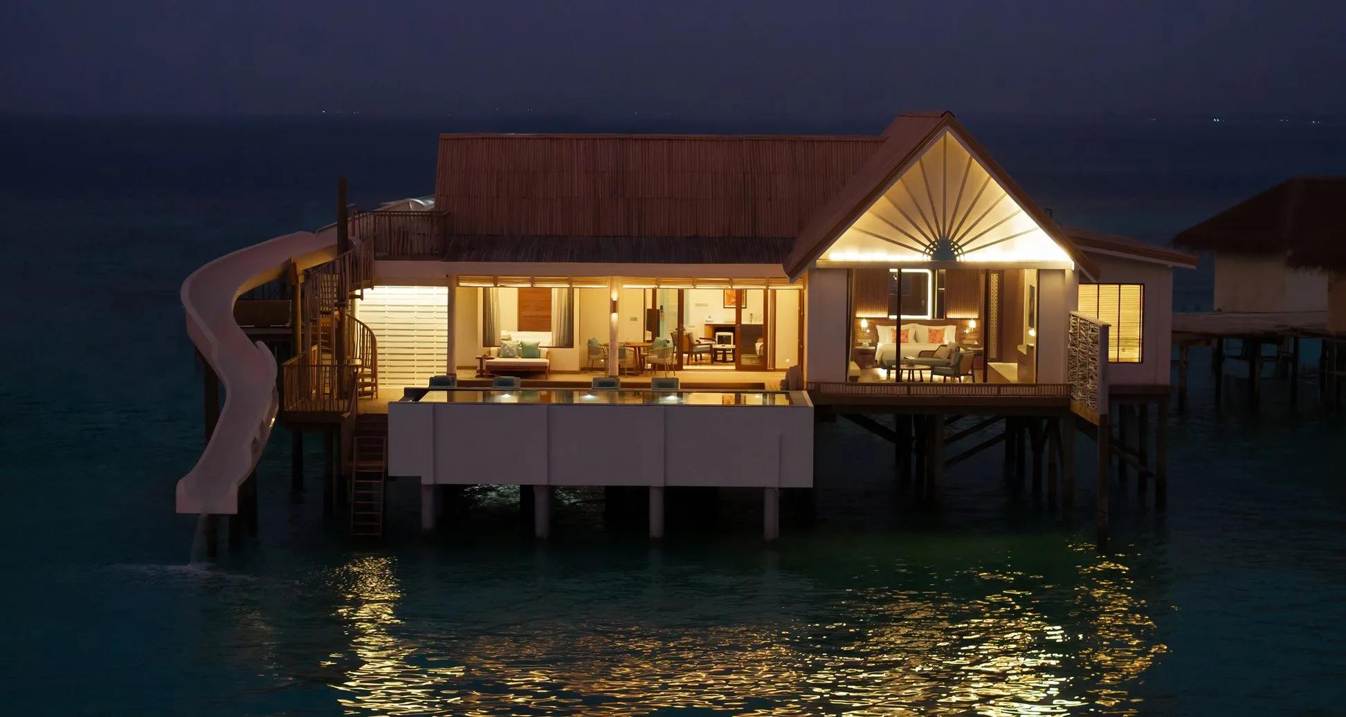 The Sunset Family Water Pool Villa with Slide – 2 Bedroom at RAH GILI Maldives, a two-bedroom overwater layout with a waterslide pool