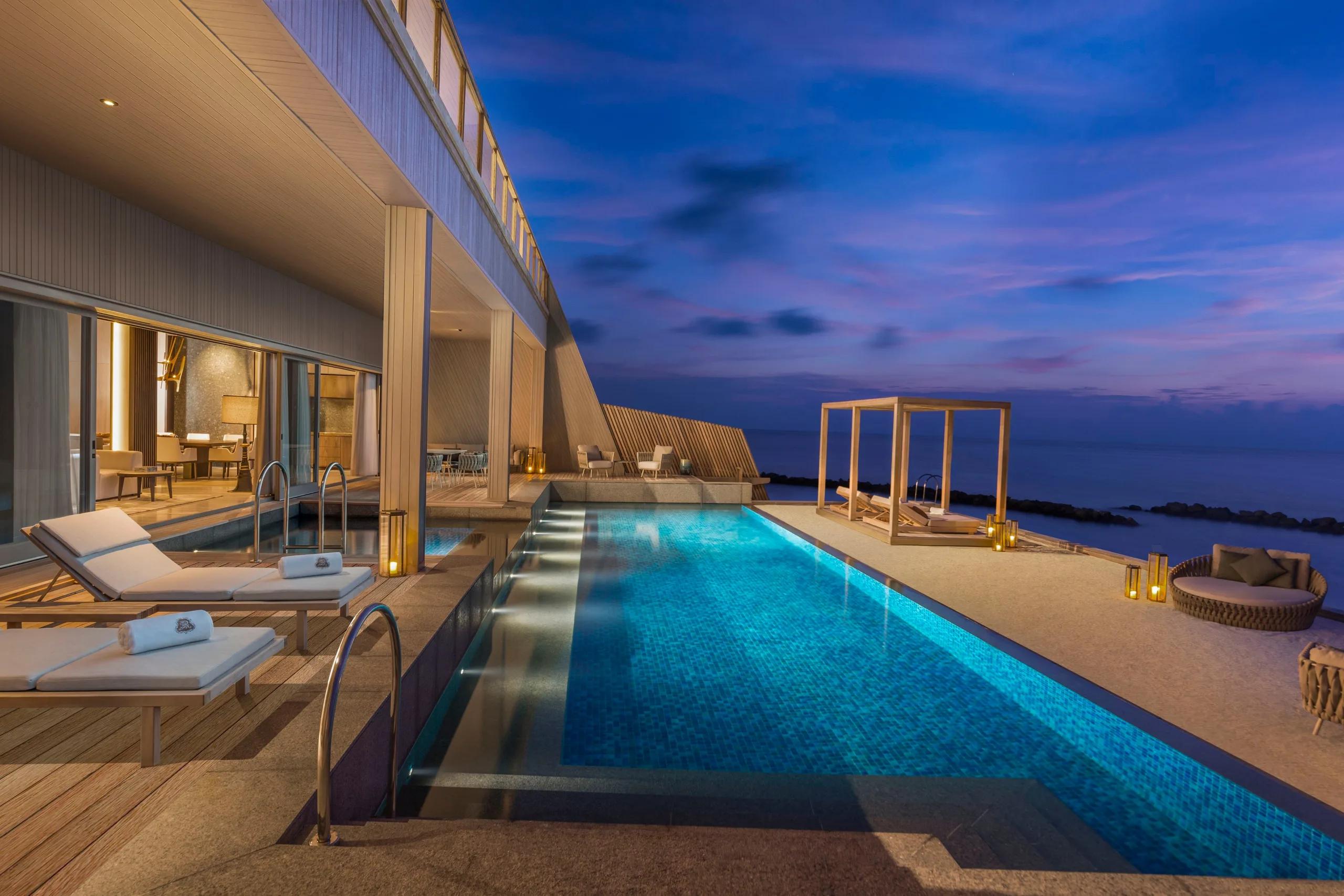 The private terrace of the John Jacob Astor Estate, built across two levels over the lagoon