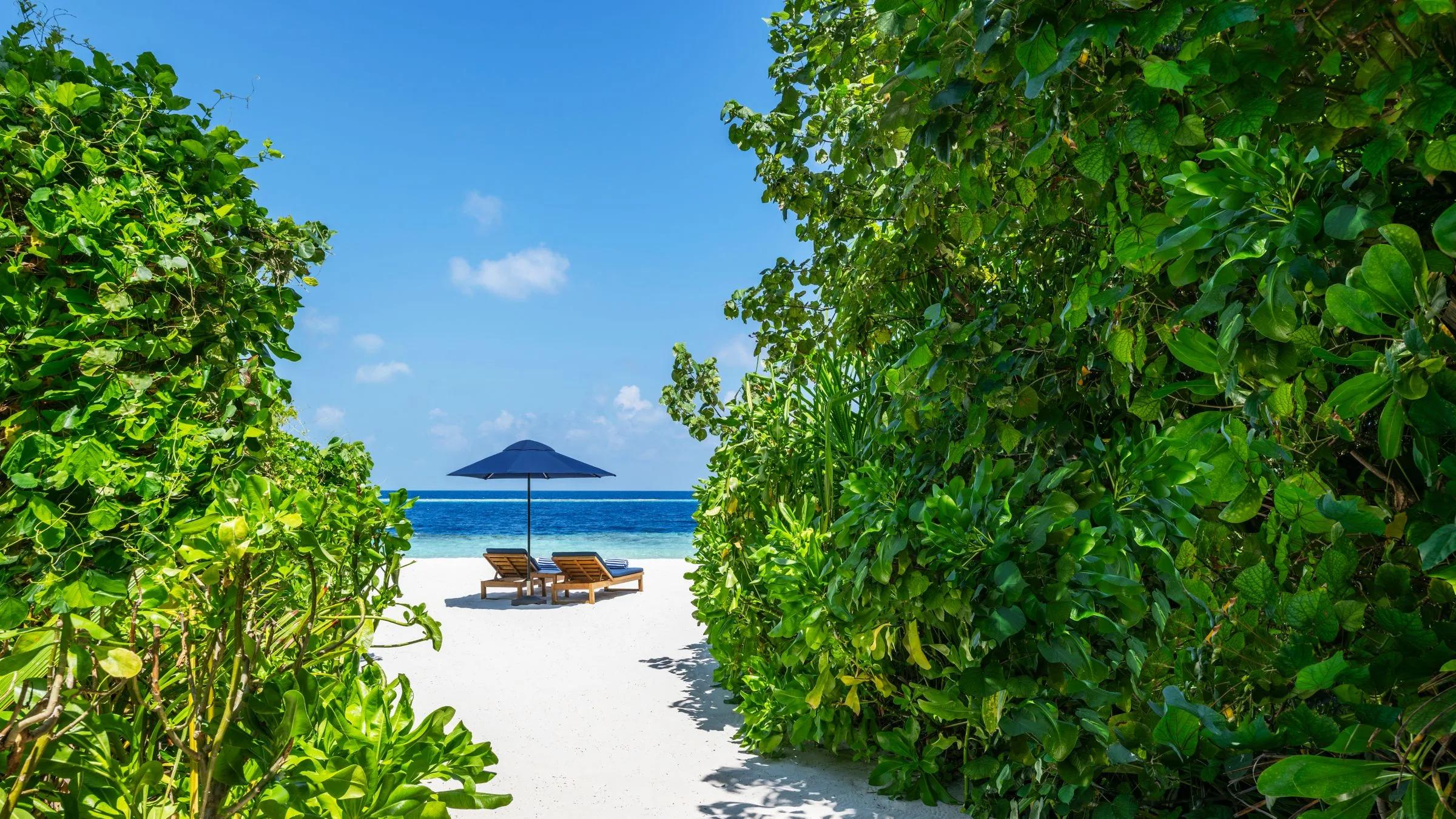An Island Beach Villa set along Halcyon's shoreline, steps from the sand