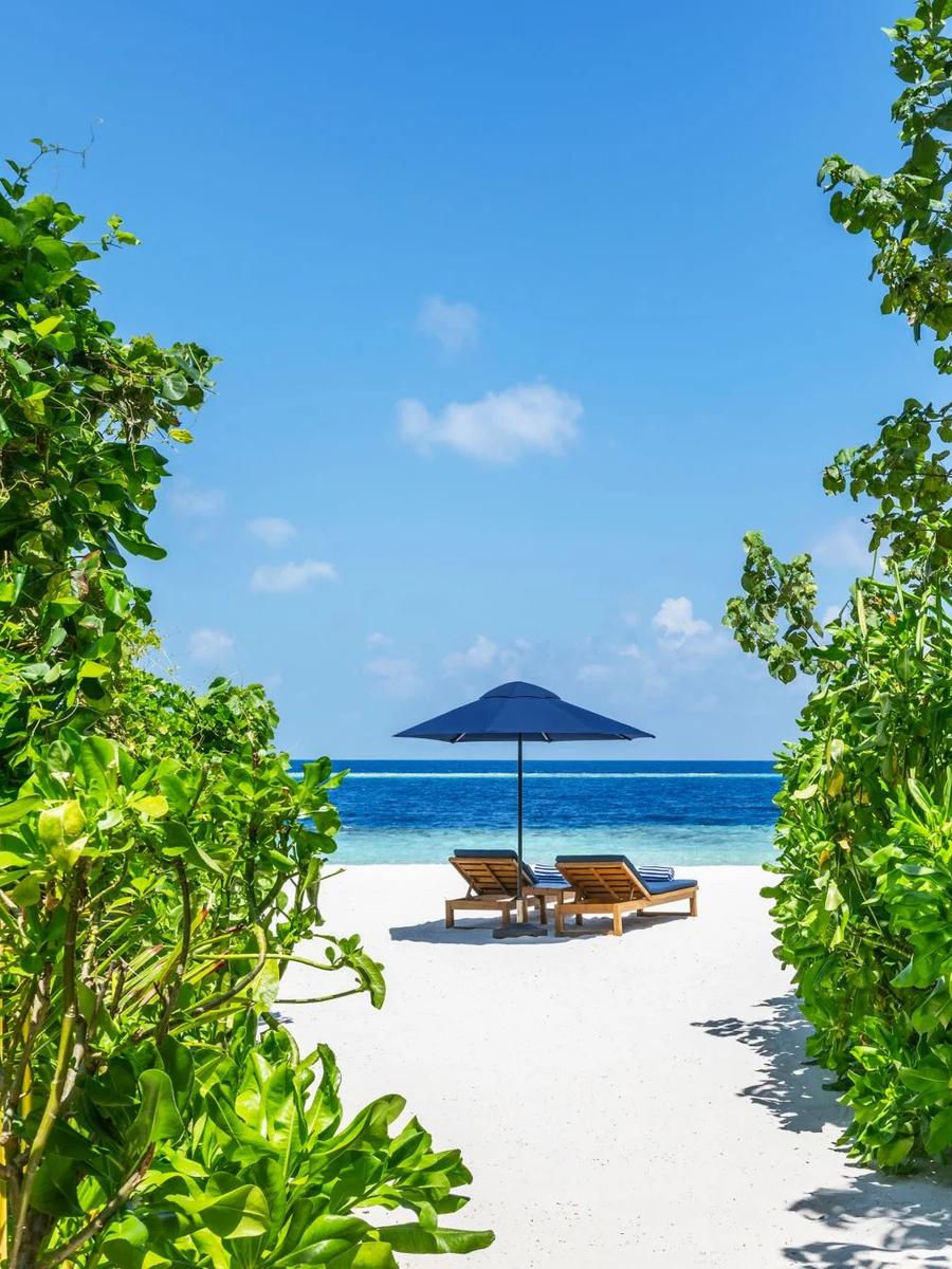 An Island Beach Villa set along Halcyon's shoreline, steps from the sand