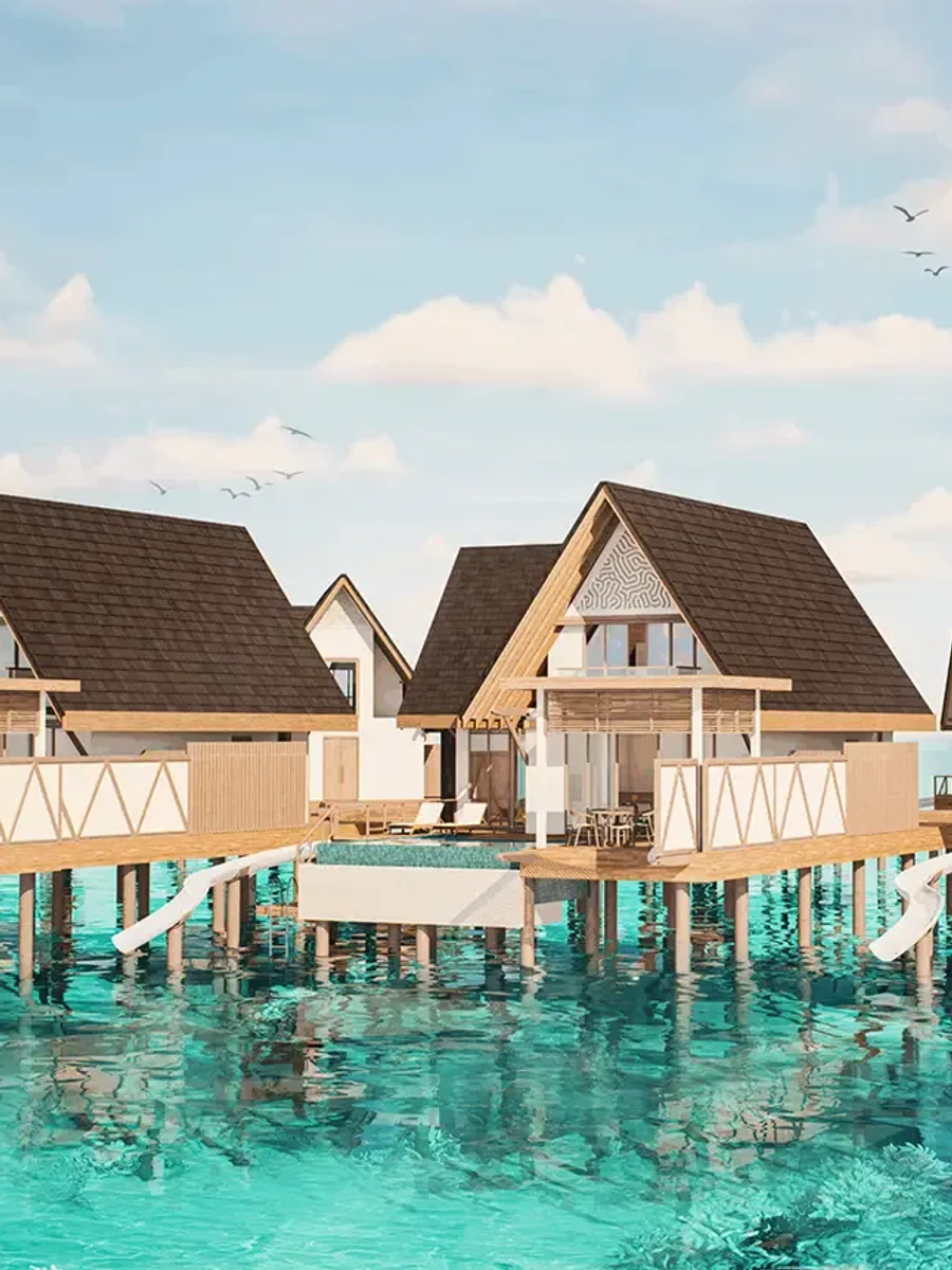 A Water Pool Suite with Slide's overwater living space and pool deck