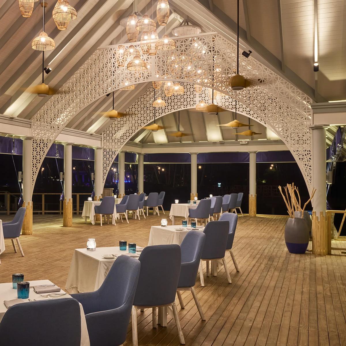 Dining and bar interior on Romance Island — the closest photographed reference for The Bar, which has no dedicated factsheet photo