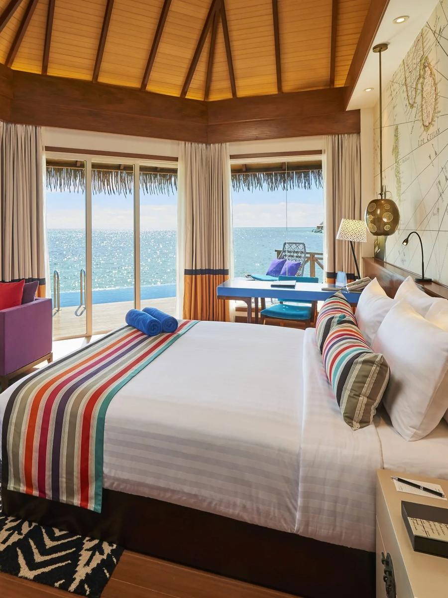The Overwater Sunrise Pool Villa's private pool and deck at Mercure Maldives Kooddoo Resort