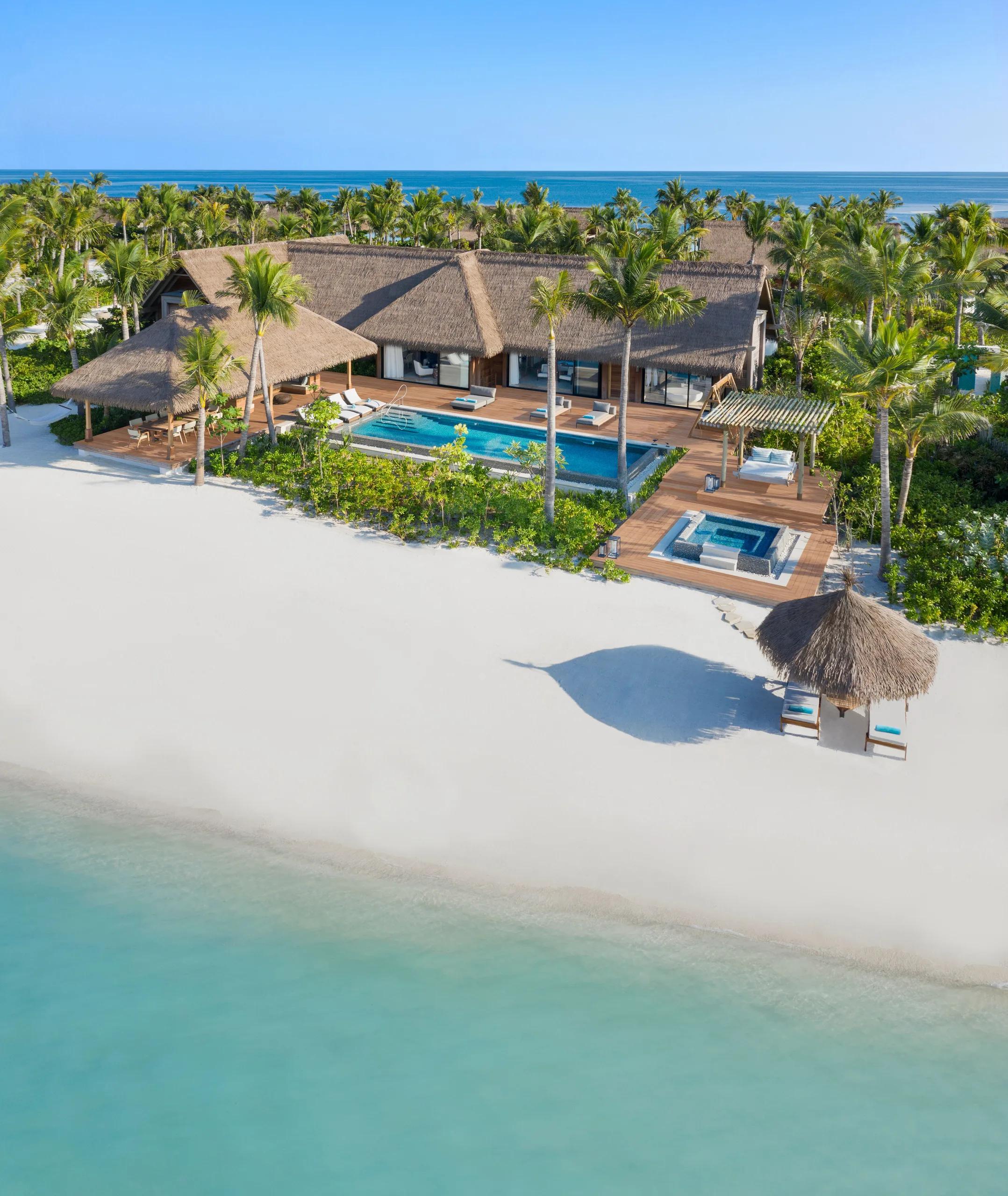 Exterior view of the Two Bedroom Beach Villa at Waldorf Astoria Maldives Ithaafushi, with direct access onto the sand