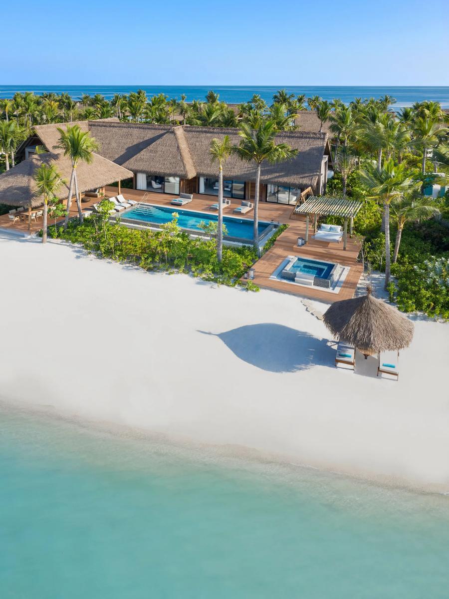 Exterior view of the Two Bedroom Beach Villa at Waldorf Astoria Maldives Ithaafushi, with direct access onto the sand