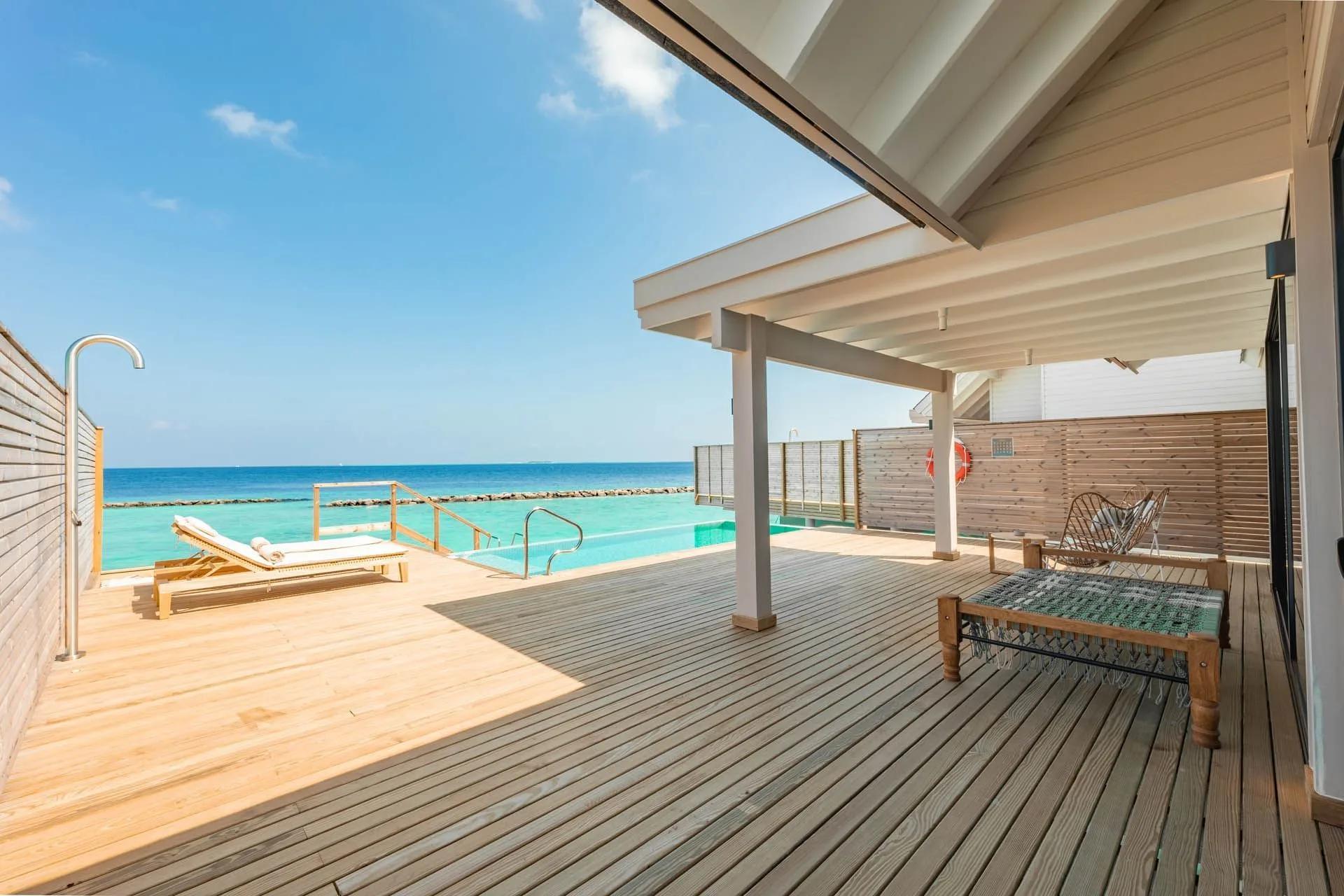 A Water Pool Villa's deck and private pool, raised over the lagoon