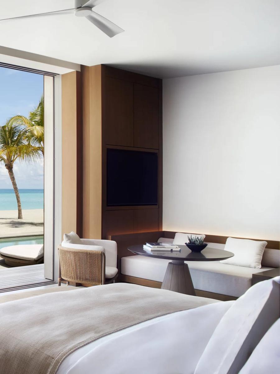 A Beach Pool Villa bedroom stepping straight onto the beach and pool deck