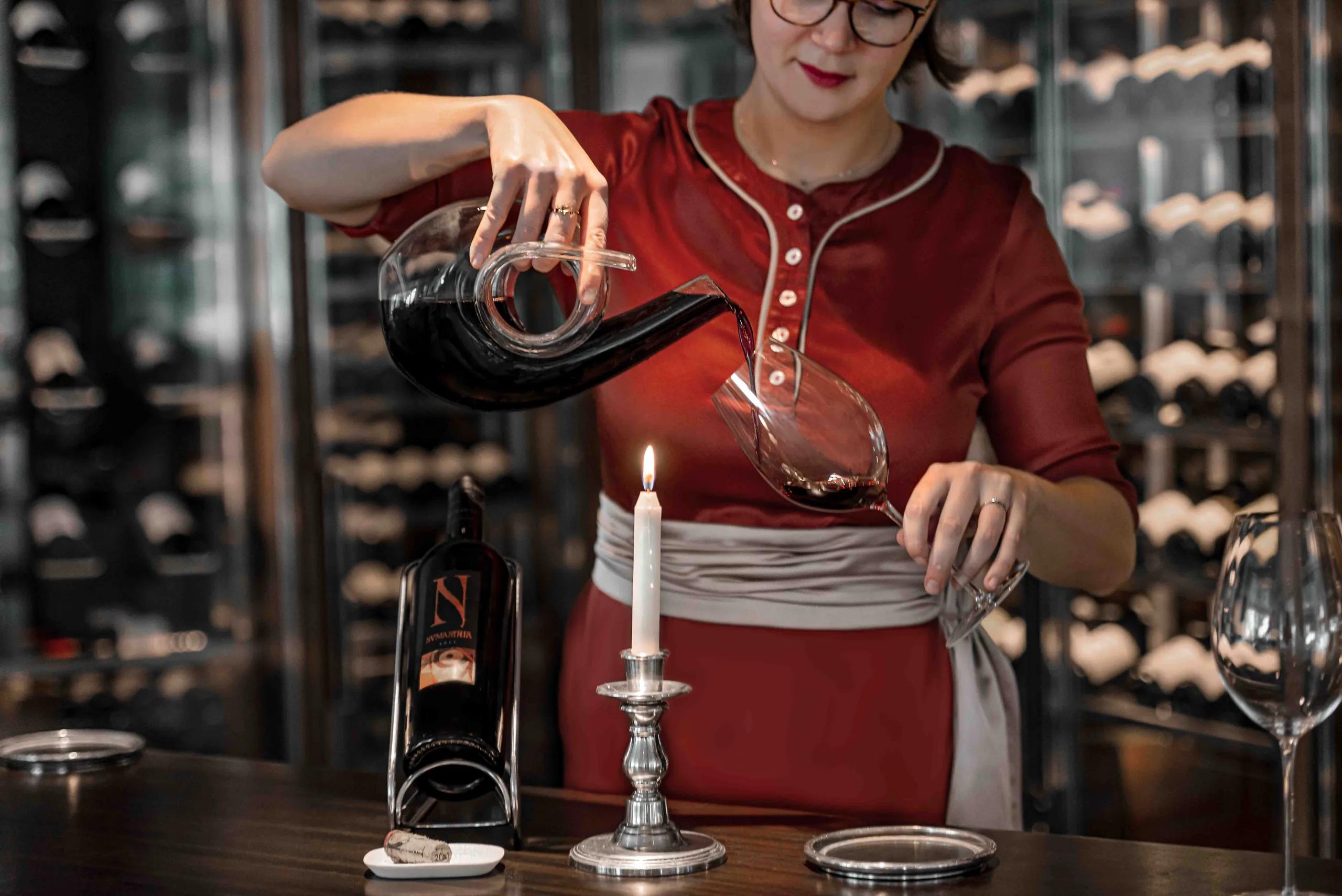 A guest in a resort's dedicated wine and cigar lounge