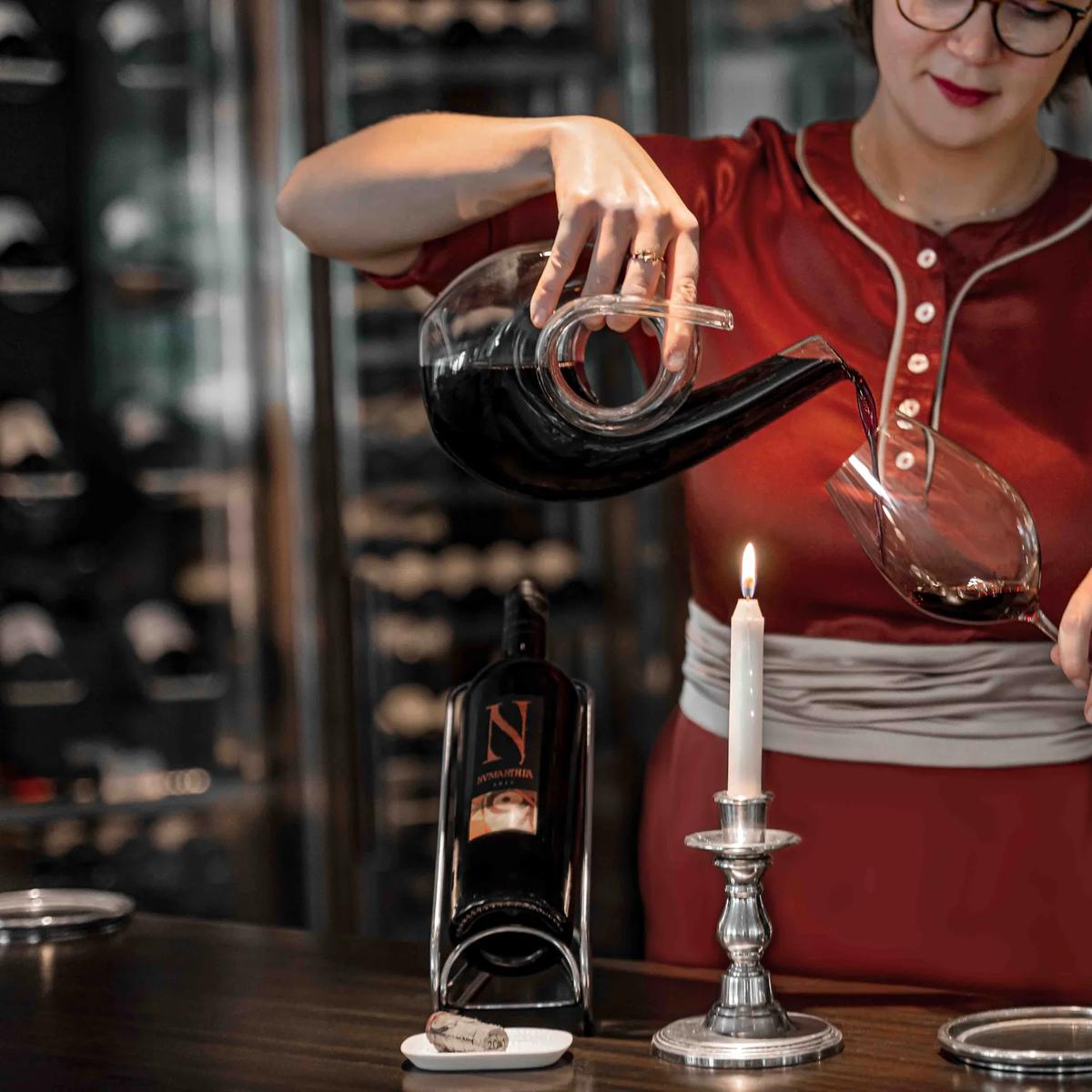 A guest in a resort's dedicated wine and cigar lounge