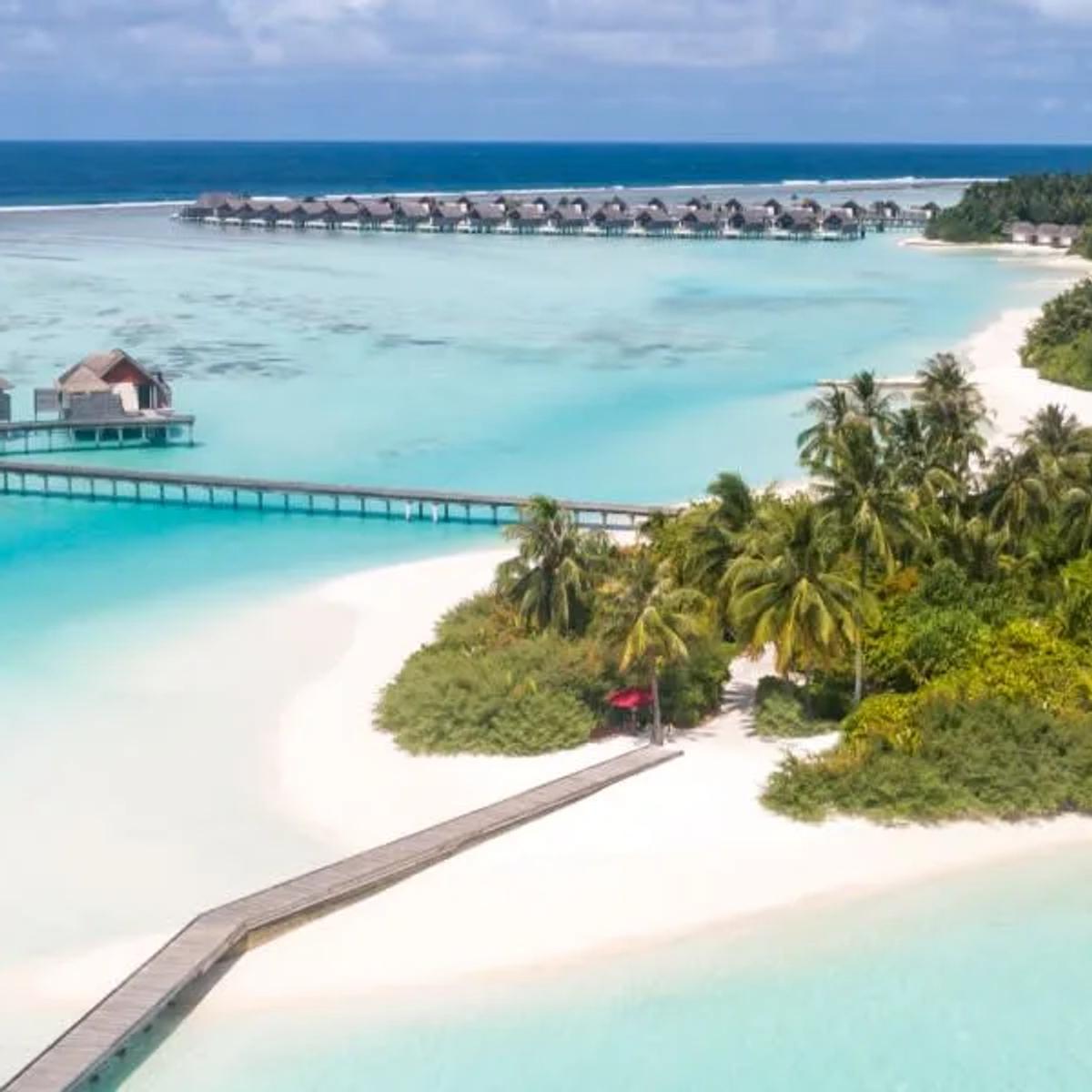 Aerial view of Niyama's Chill and Play islands, linked by an overwater boardwalk across Dhaalu Atoll's lagoon